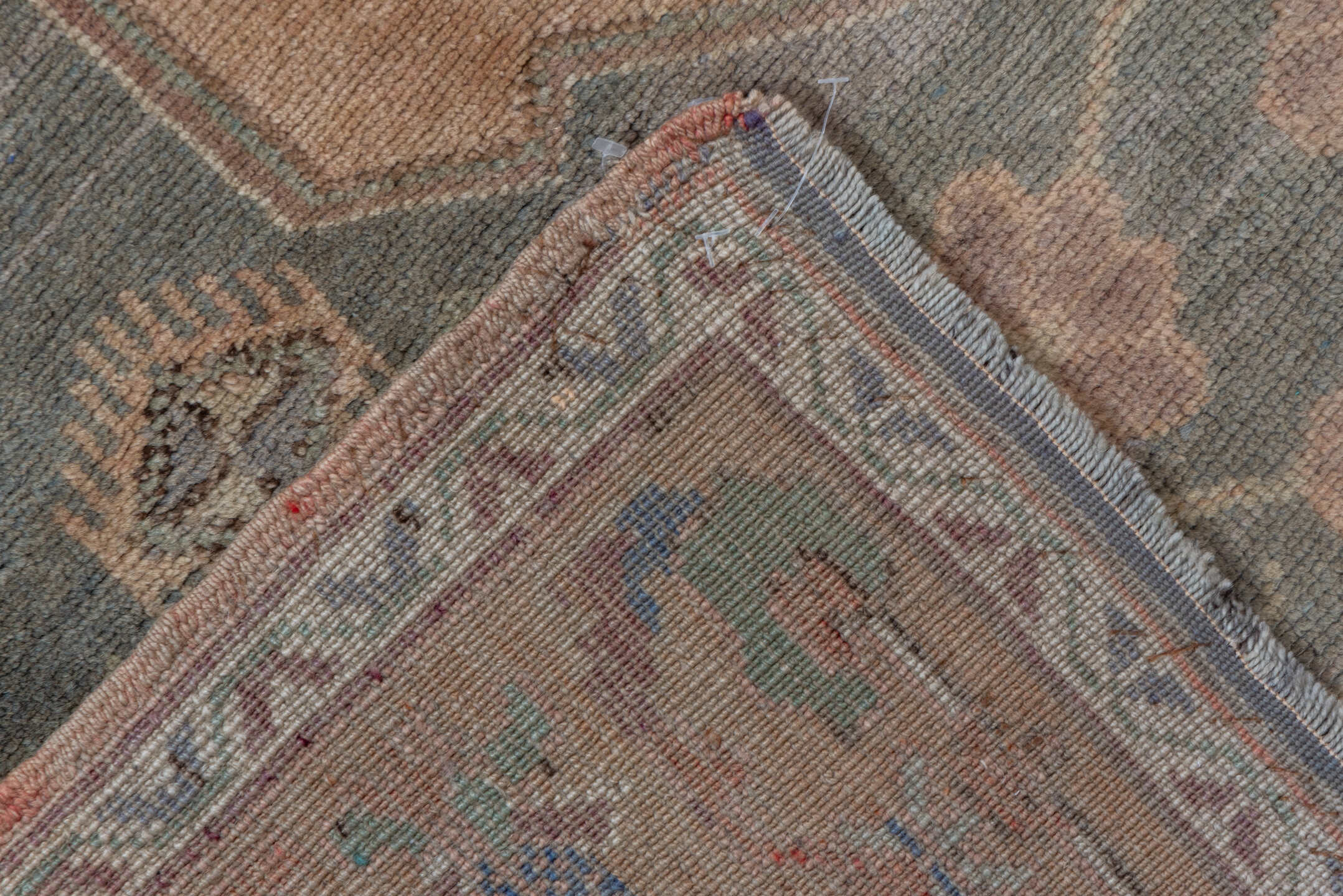 5' x 11' one-of-a-kind handmade vintage Oushak rug. Color palette: brown, gray, light gray, pink