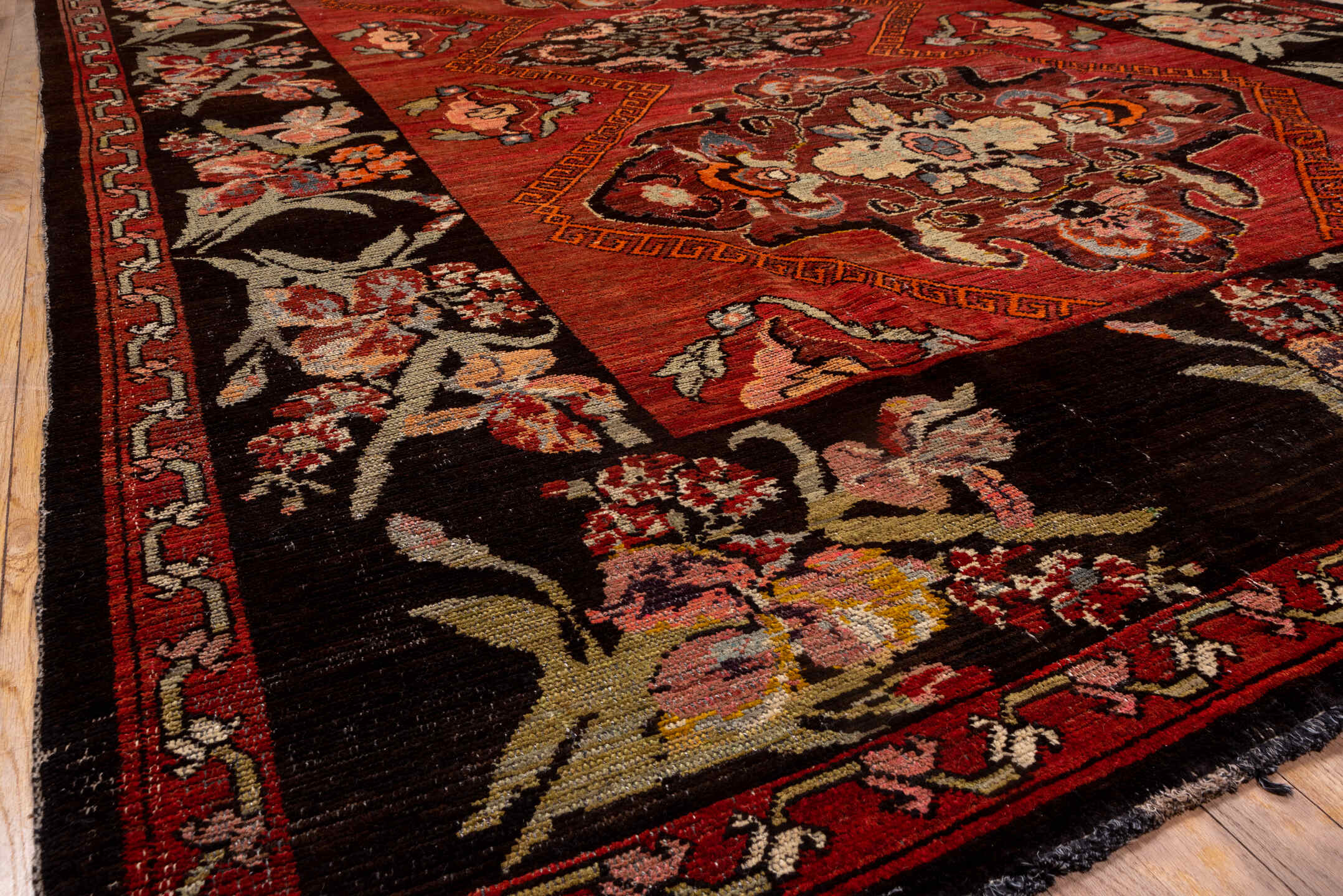 7' x 12' one-of-a-kind handmade antique Kars large size rug. Color palette: rust, charcoal, coral, ivory, rose, slate
