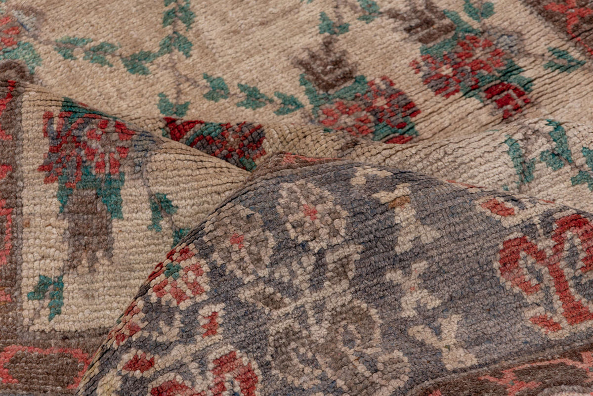 5' x 10' one-of-a-kind handmade vintage Konya rug. Color palette: ivory, charcoal, rust, teal, taupe, gold, crimson, gray