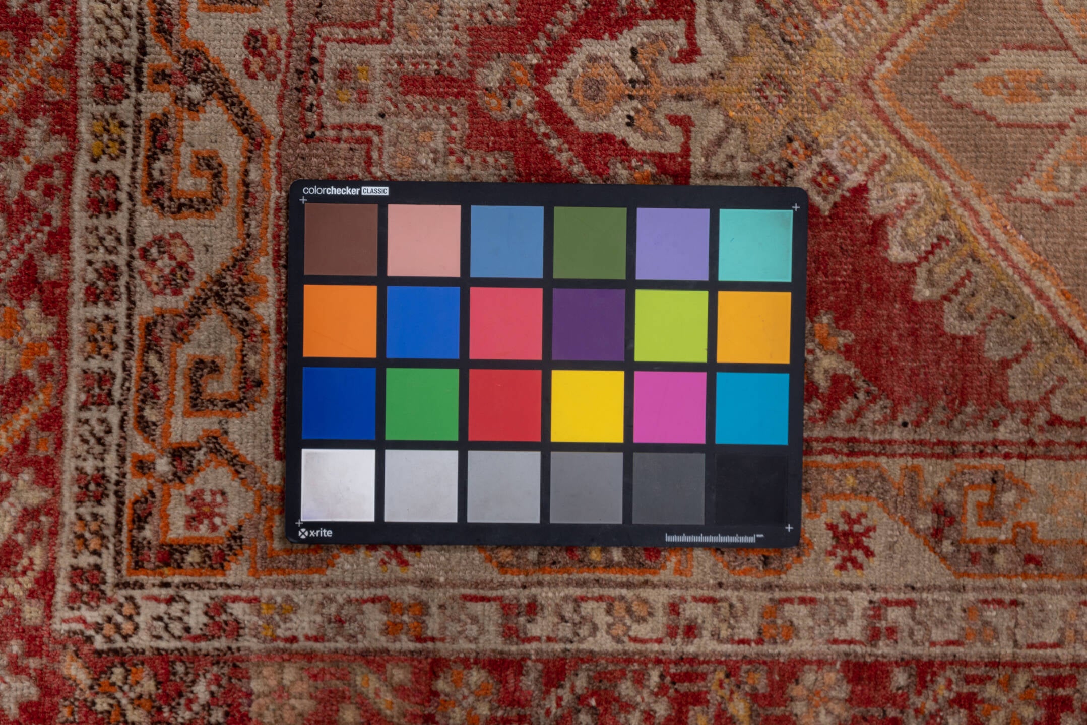 3' x 10' one-of-a-kind handmade vintage Sivas runner rug. Color palette: brown, gray, off-white, pink, red, snow, white