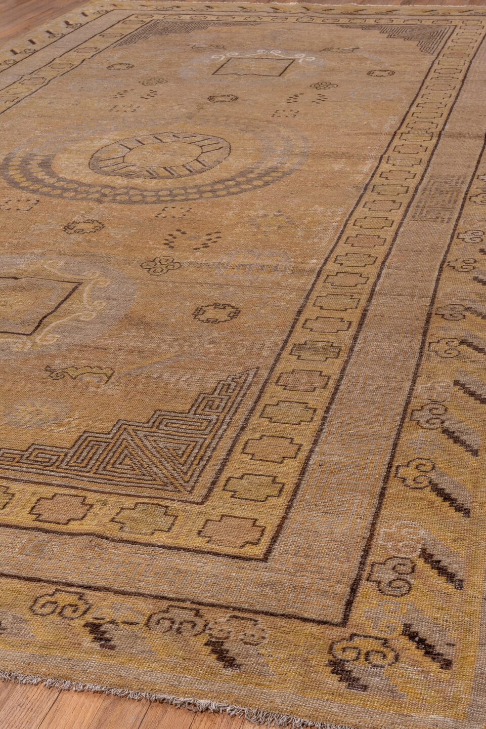 7' x 13' one-of-a-kind handmade antique Khotan large size rug. Color palette: camel, taupe, beige, brown, ivory, ochre, gray
