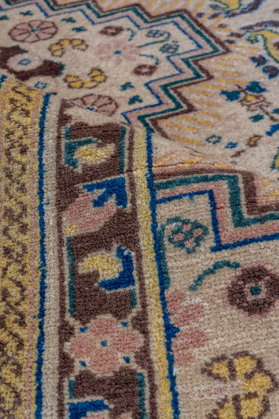 5' x 8' one-of-a-kind handmade vintage Sivas medium size rug. Color palette: ivory, blue, brown, taupe, gold, camel, beige