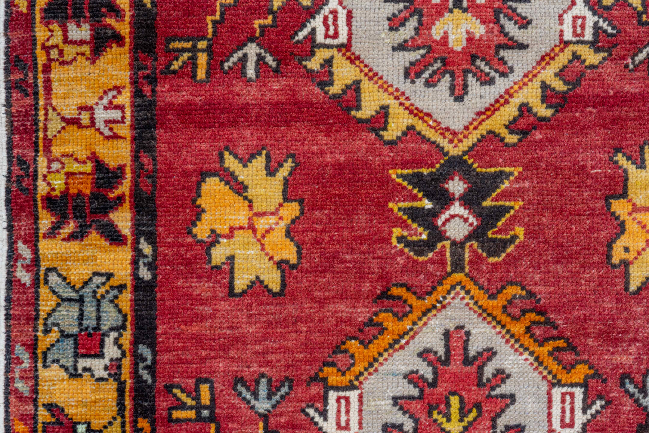 2' x 9' one-of-a-kind handmade vintage Oushak runner rug. Color palette: red, gold, ivory, rust, saffron, charcoal, rose