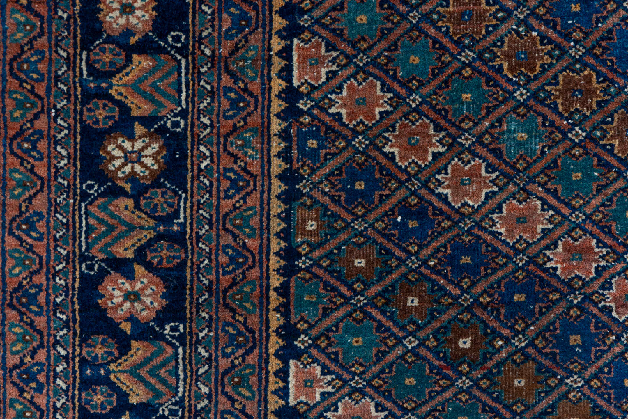 5' x 7' one-of-a-kind handmade antique Afshar rug. Color palette: navy, rust, camel, teal, ivory, rose, brown, blue