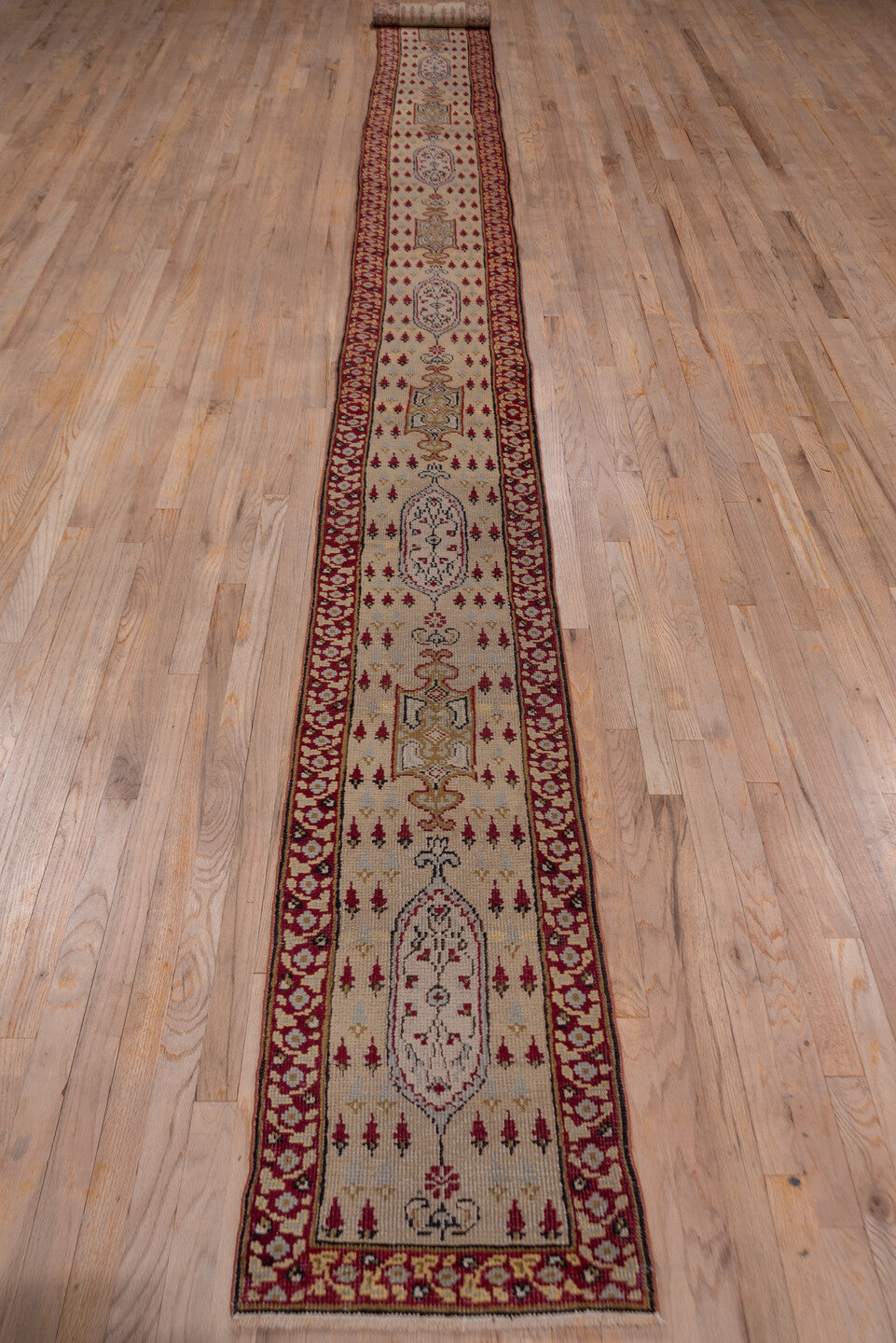 1' x 18' one-of-a-kind handmade vintage Oushak rug. Color palette: brown, gray, off-white, pink, red, redwood, snow, white