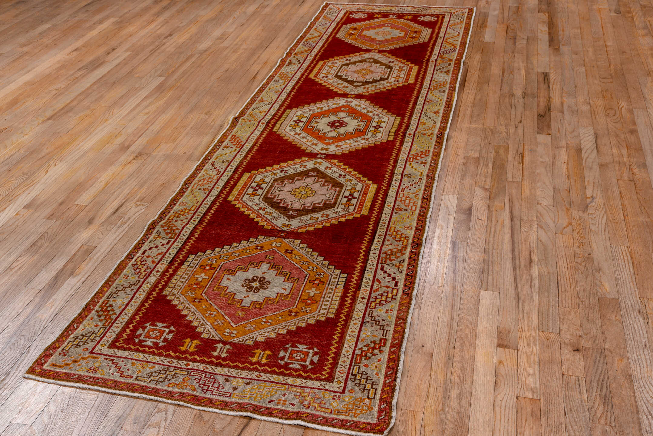 3' x 11' one-of-a-kind handmade vintage Oushak runner rug. Color palette: brown, fire brick, gray, light gray, off-white