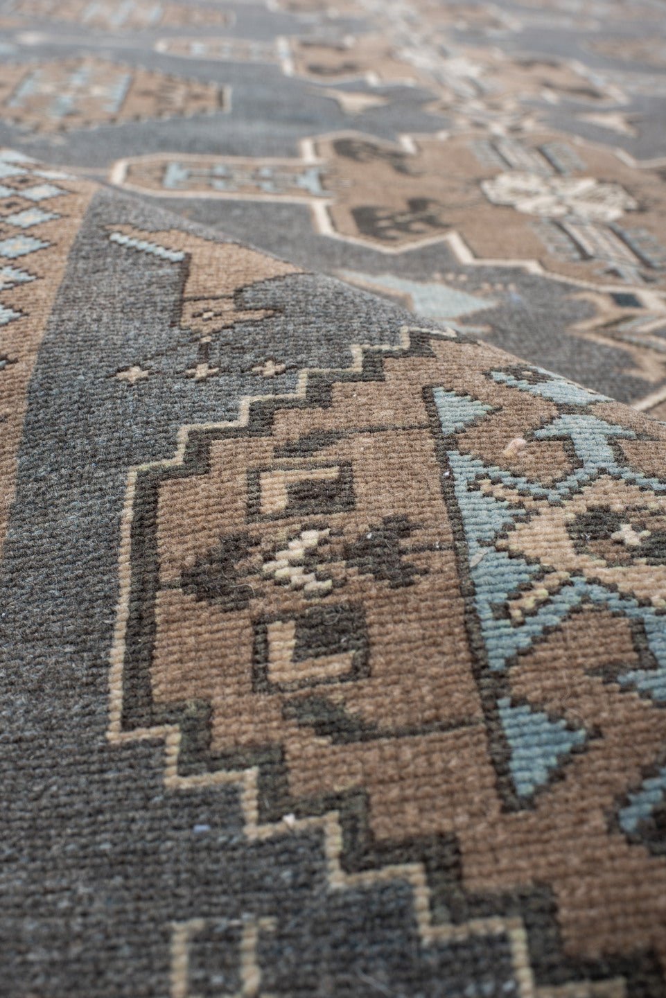 4' x 12' one-of-a-kind handmade vintage Malayer runner rug. Color palette: charcoal, taupe, ivory, sky blue, brown, slate