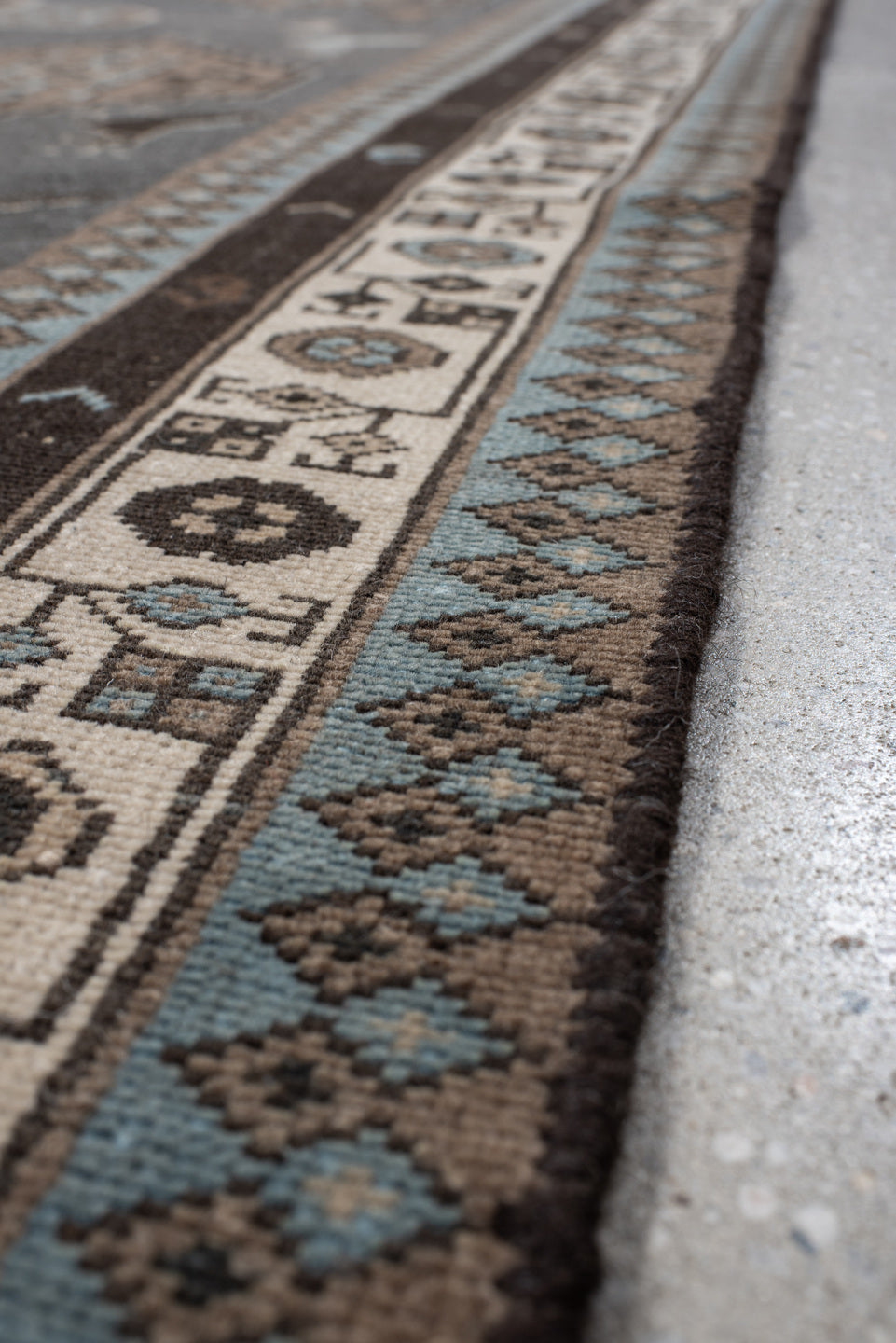 4' x 12' one-of-a-kind handmade vintage Malayer runner rug. Color palette: charcoal, taupe, ivory, sky blue, brown, slate
