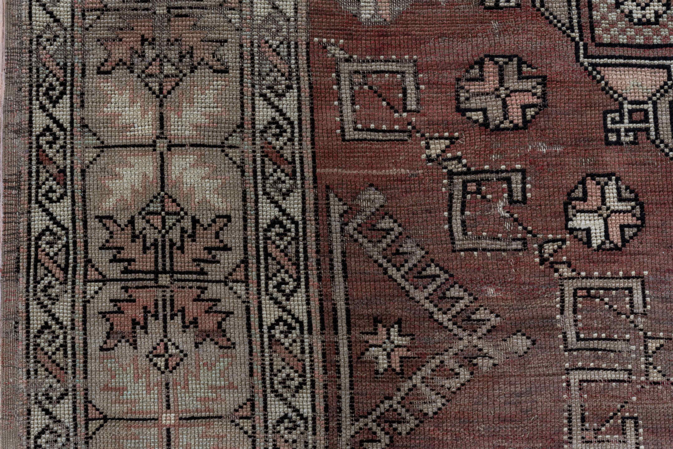 5' x 7' one-of-a-kind handmade vintage Oushak rug. Color palette: black, brown, gray, light gray, pink