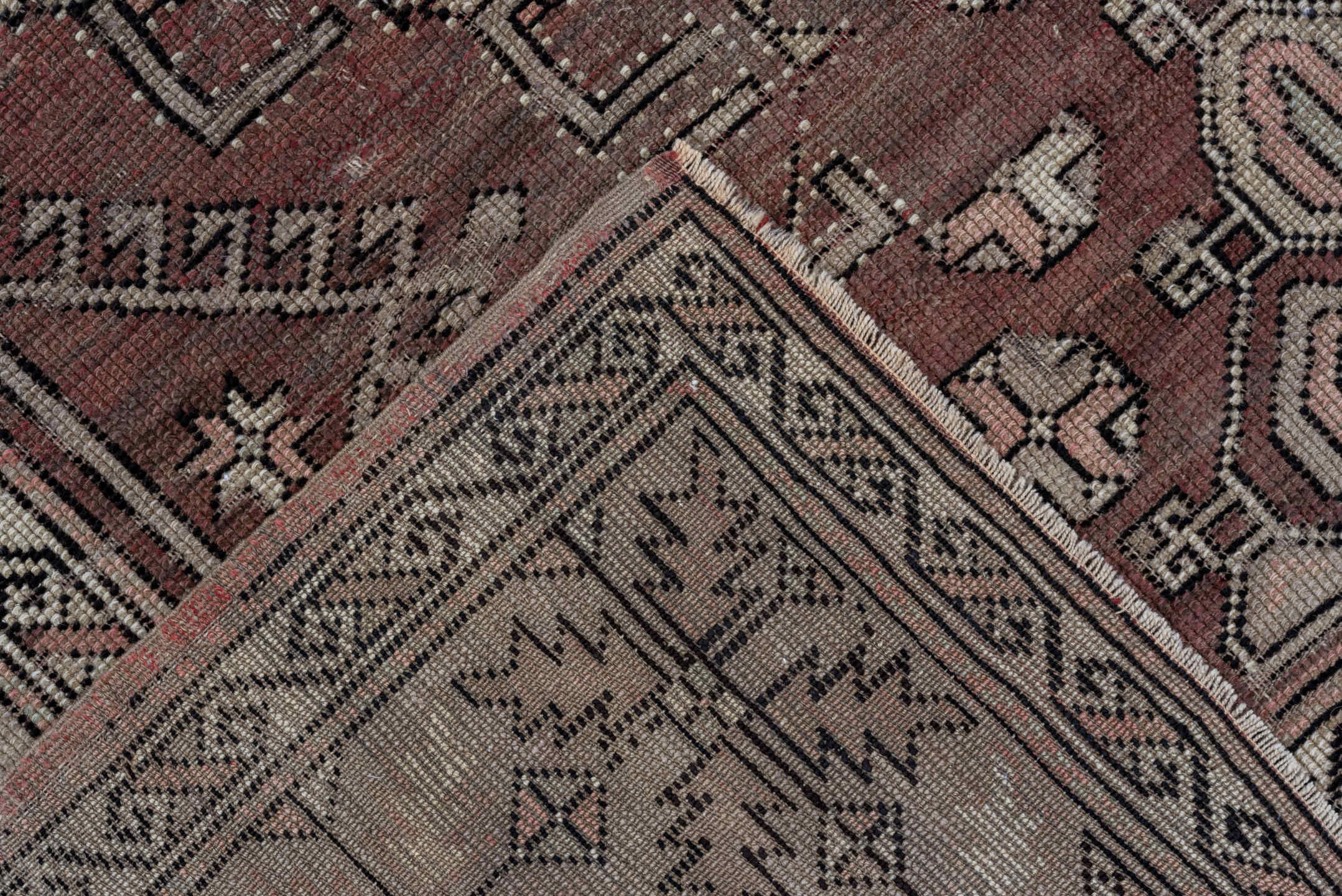 5' x 7' one-of-a-kind handmade vintage Oushak rug. Color palette: black, brown, gray, light gray, pink