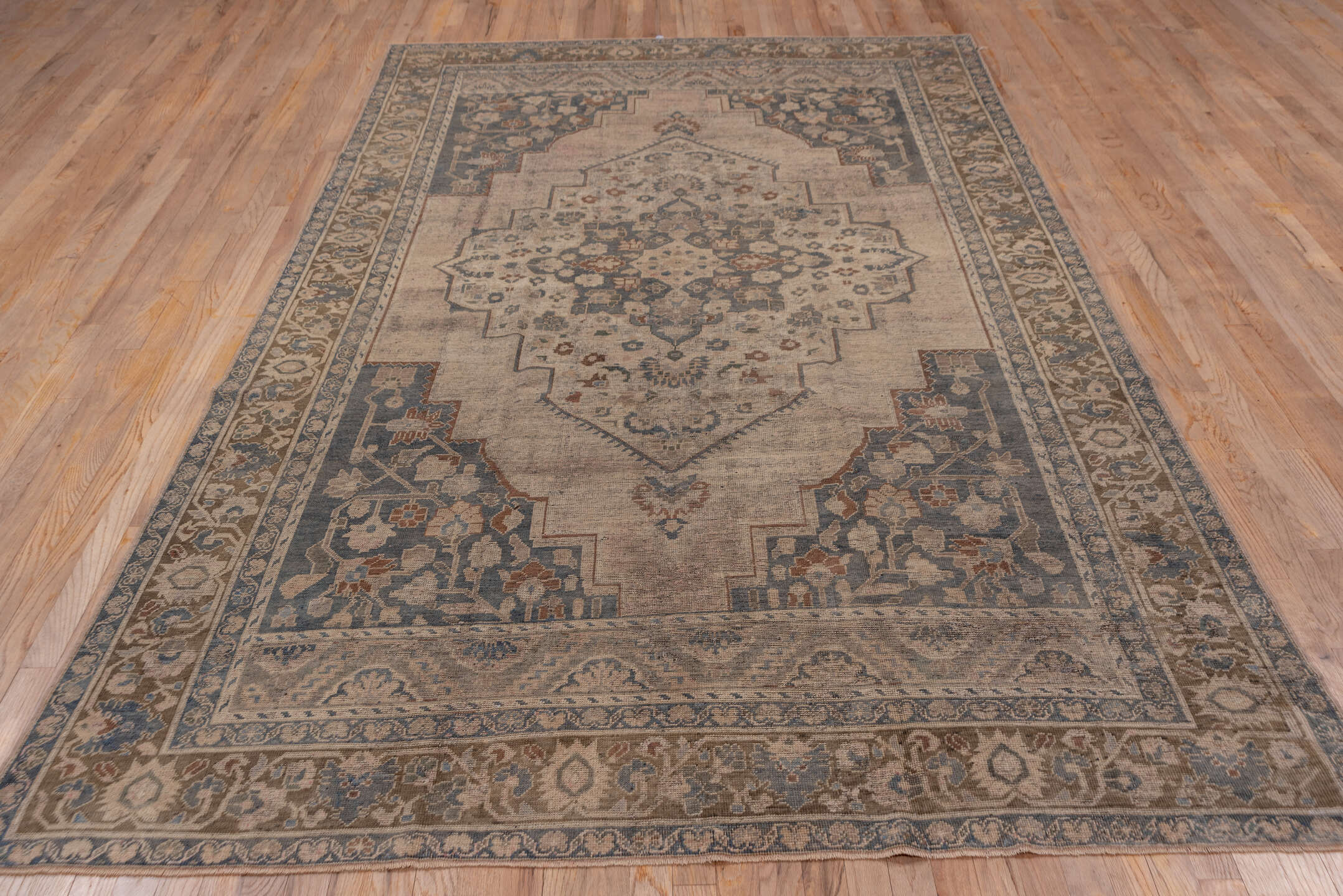 6' x 10' one-of-a-kind handmade vintage Oushak large size rug. Color palette: taupe, slate, ivory, camel, rust, blue, brown