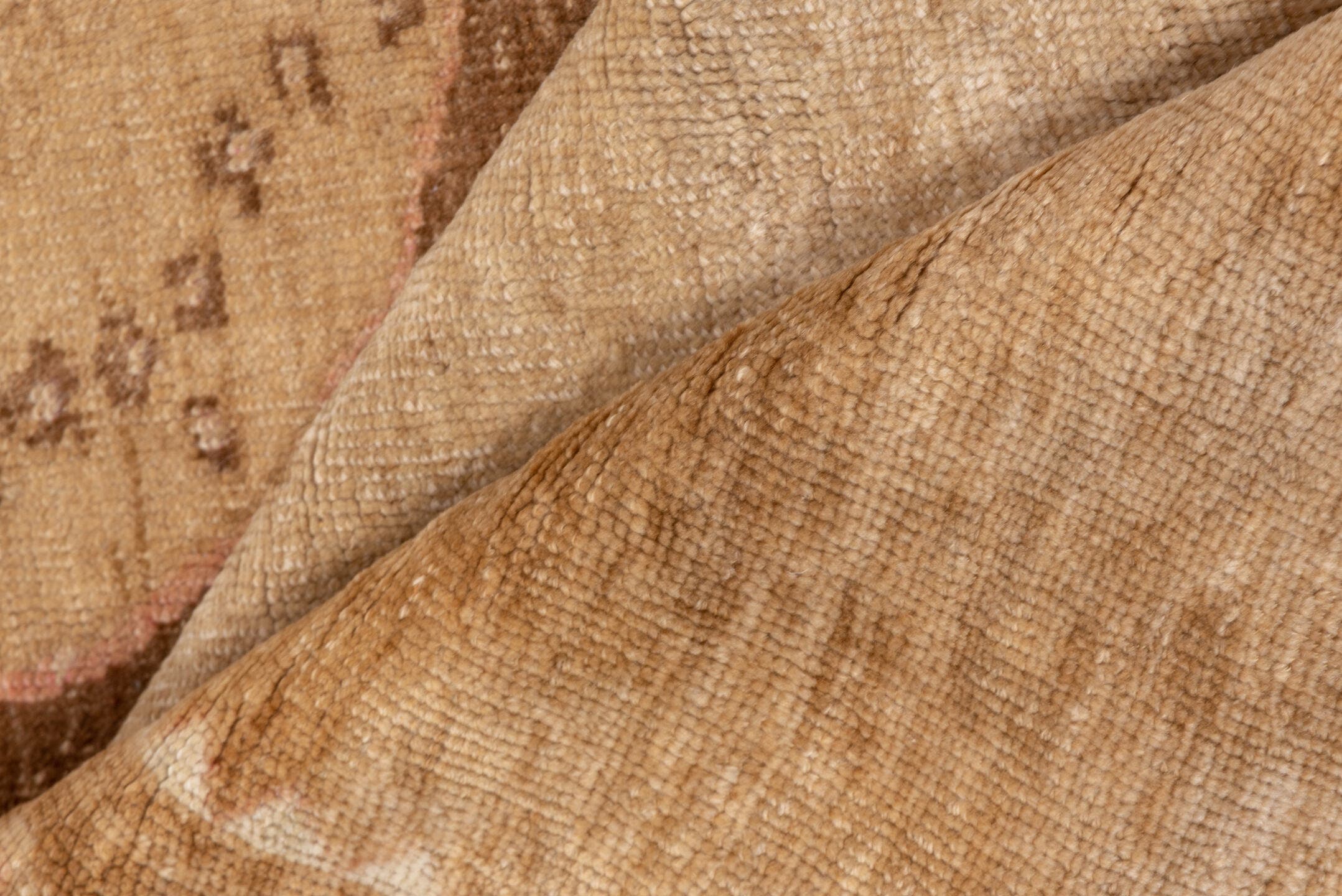 7' x 9' one-of-a-kind handmade vintage Oushak rug. Color palette: camel, ivory, taupe, beige, tan, brown, gray