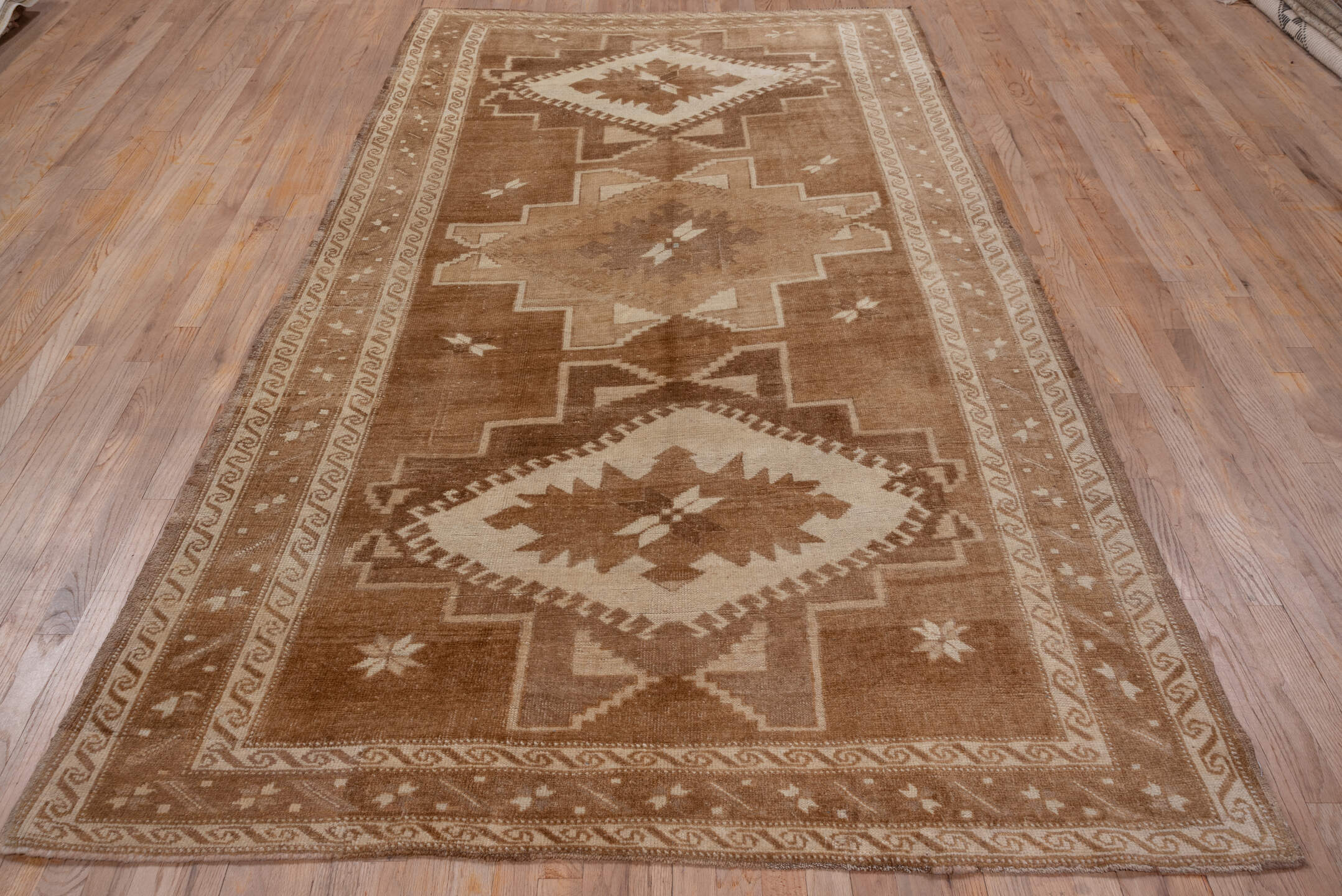 5' x 9' one-of-a-kind handmade vintage Oushak medium size rug. Color palette: camel, taupe, ivory, tan, brown, beige, gray