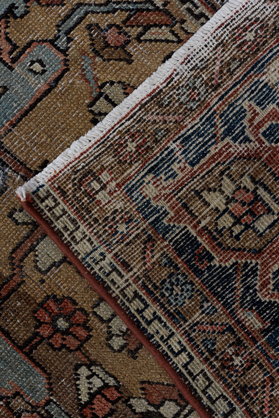 6' x 9' one-of-a-kind handmade antique Heriz medium size rug. Color palette: terra cotta, navy, ivory, slate, taupe, rust