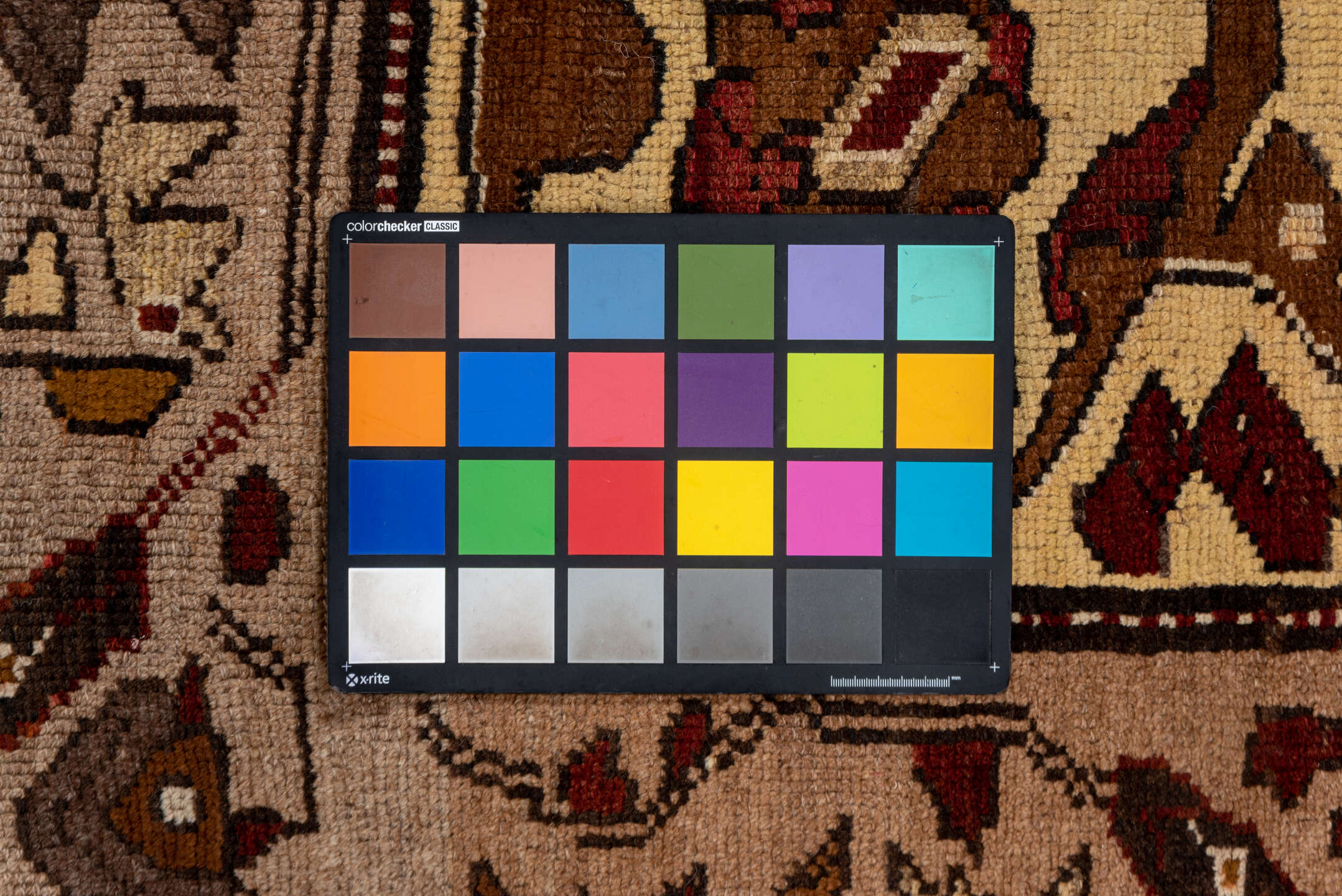 7' x 9' one-of-a-kind handmade vintage Kars rug. Color palette: taupe, brown, ivory, walnut, rust, charcoal, camel, burgundy