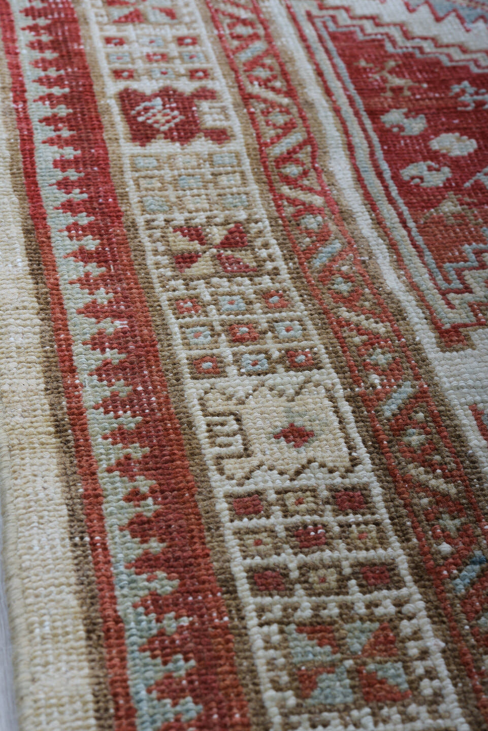 3' x 15' one-of-a-kind handmade vintage Sarab runner rug. Color palette: ivory, rust, brick, indigo, sky_blue, taupe