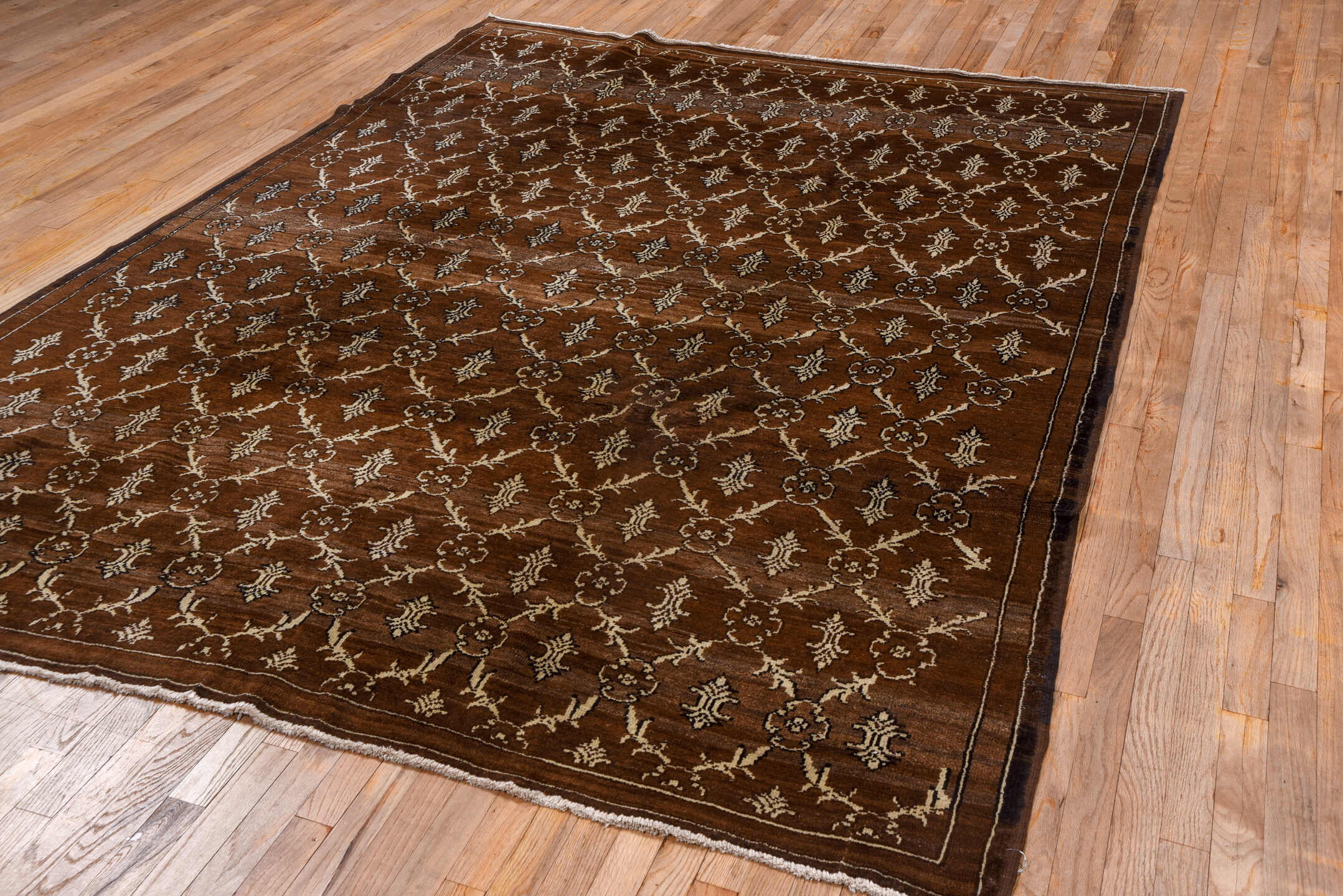 7' x 9' one-of-a-kind handmade vintage Kars rug. Color palette: brown, gray, light gray, off-white, pink