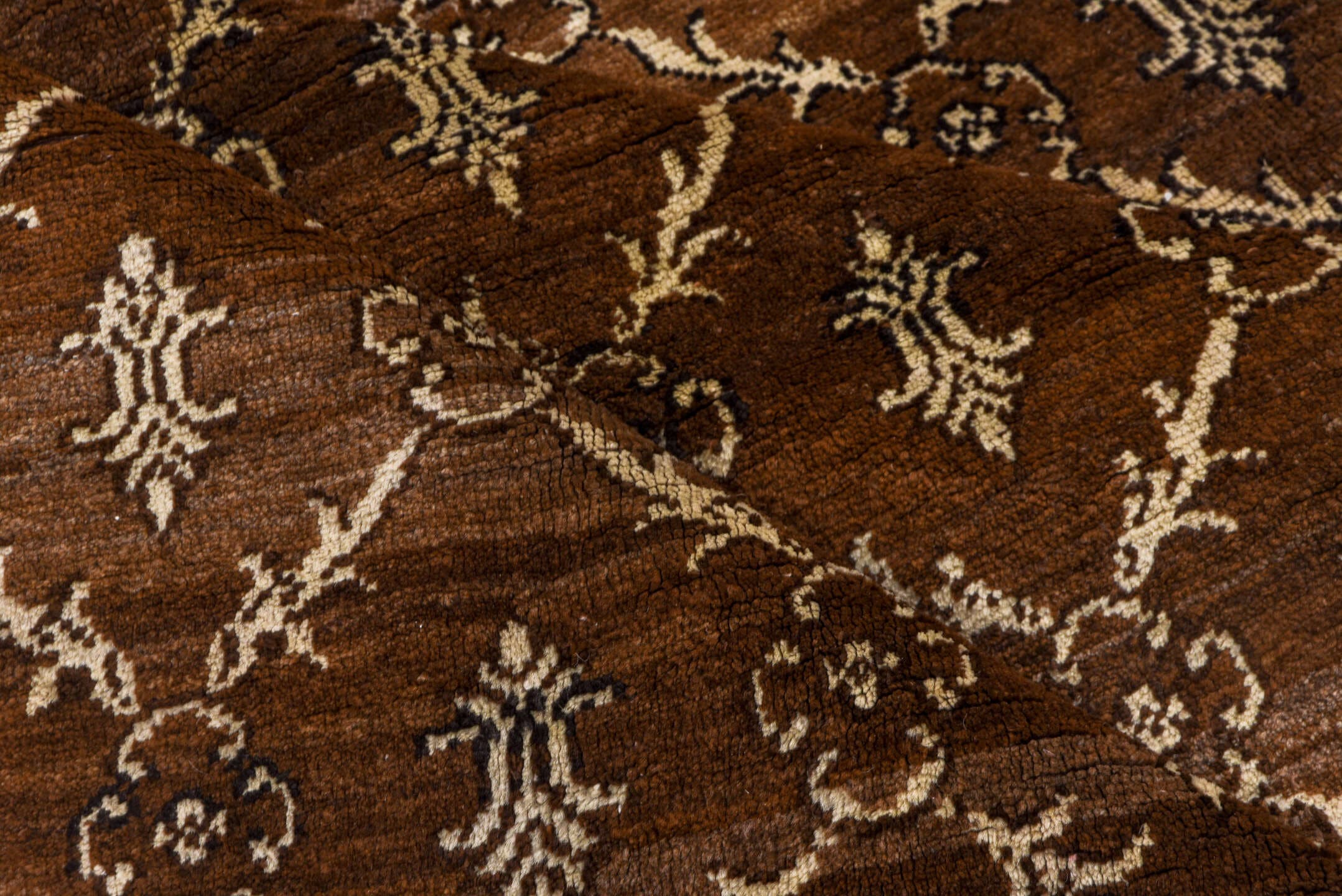 7' x 9' one-of-a-kind handmade vintage Kars rug. Color palette: brown, ivory, taupe, camel, charcoal, beige, gray, black