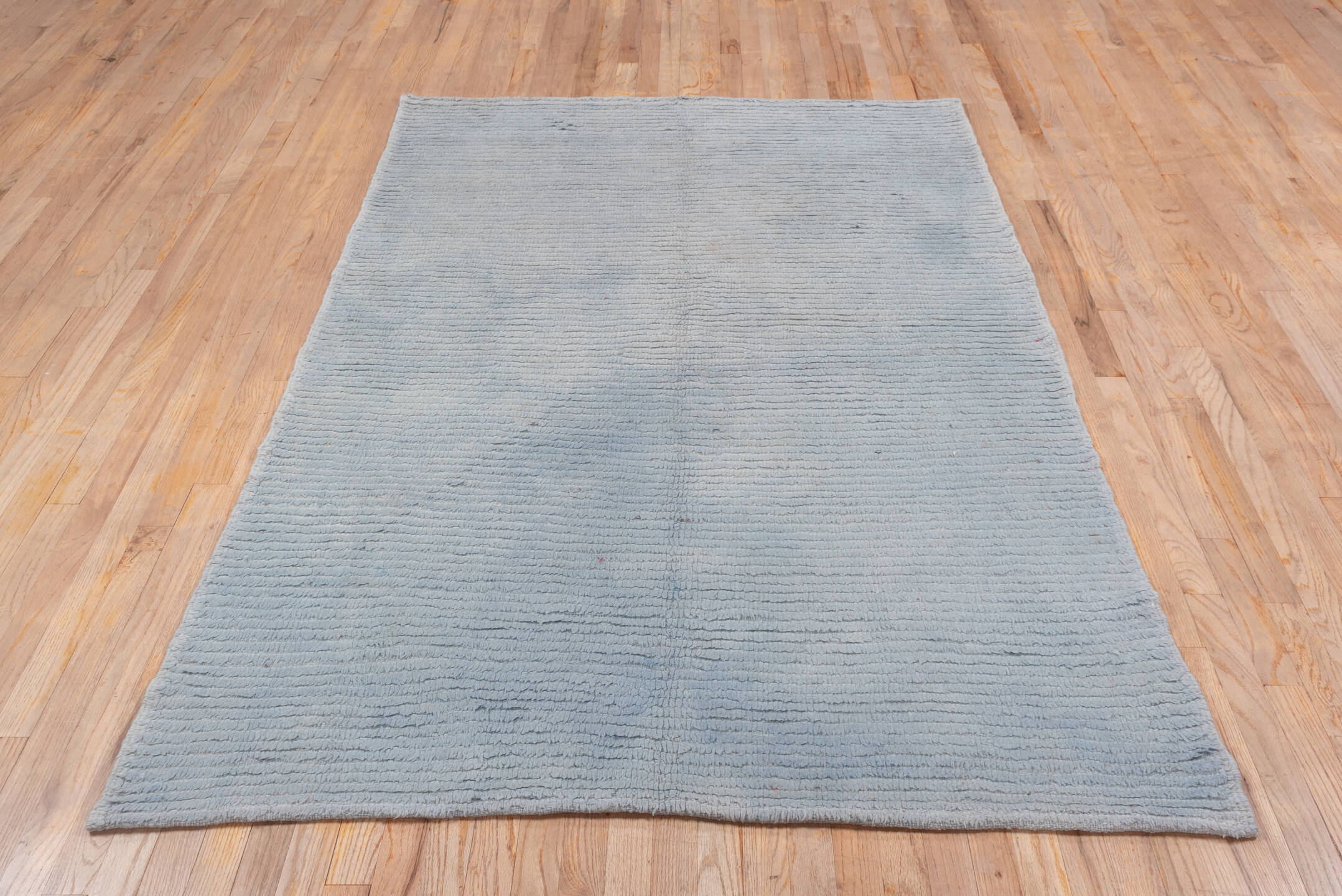 5' x 7' one-of-a-kind handmade antique Konya rug. Color palette: ivory, pale blue, cream, taupe, light blue, beige, gray