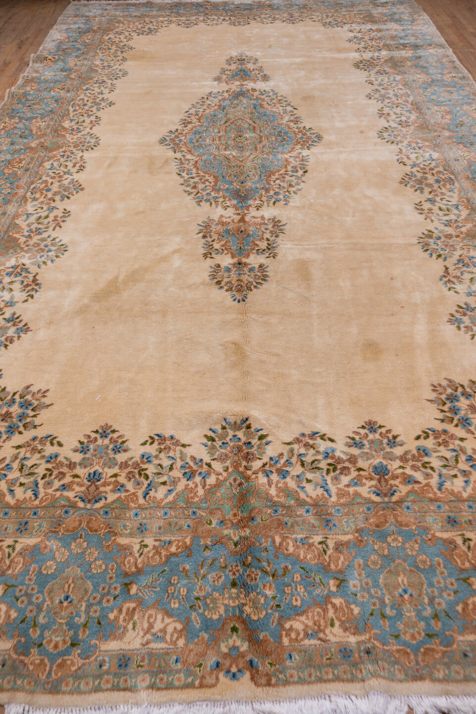 9' x 18' one-of-a-kind handmade vintage Kerman rug. Color palette: ivory, sky blue, beige, taupe, camel, slate, light blue