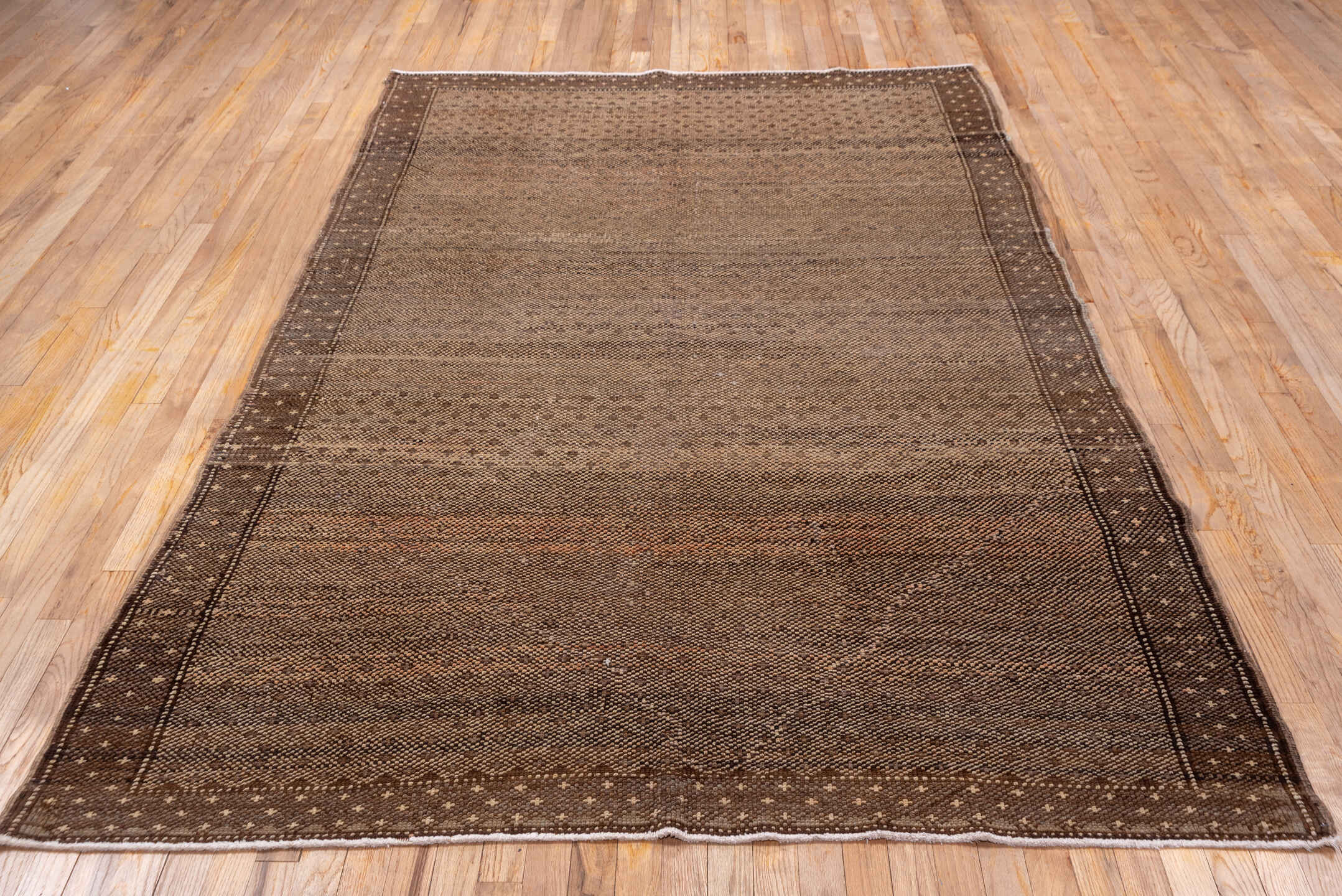 5' x 9' one-of-a-kind handmade vintage Oushak medium size rug. Color palette: brown, taupe, camel, ivory, charcoal, beige