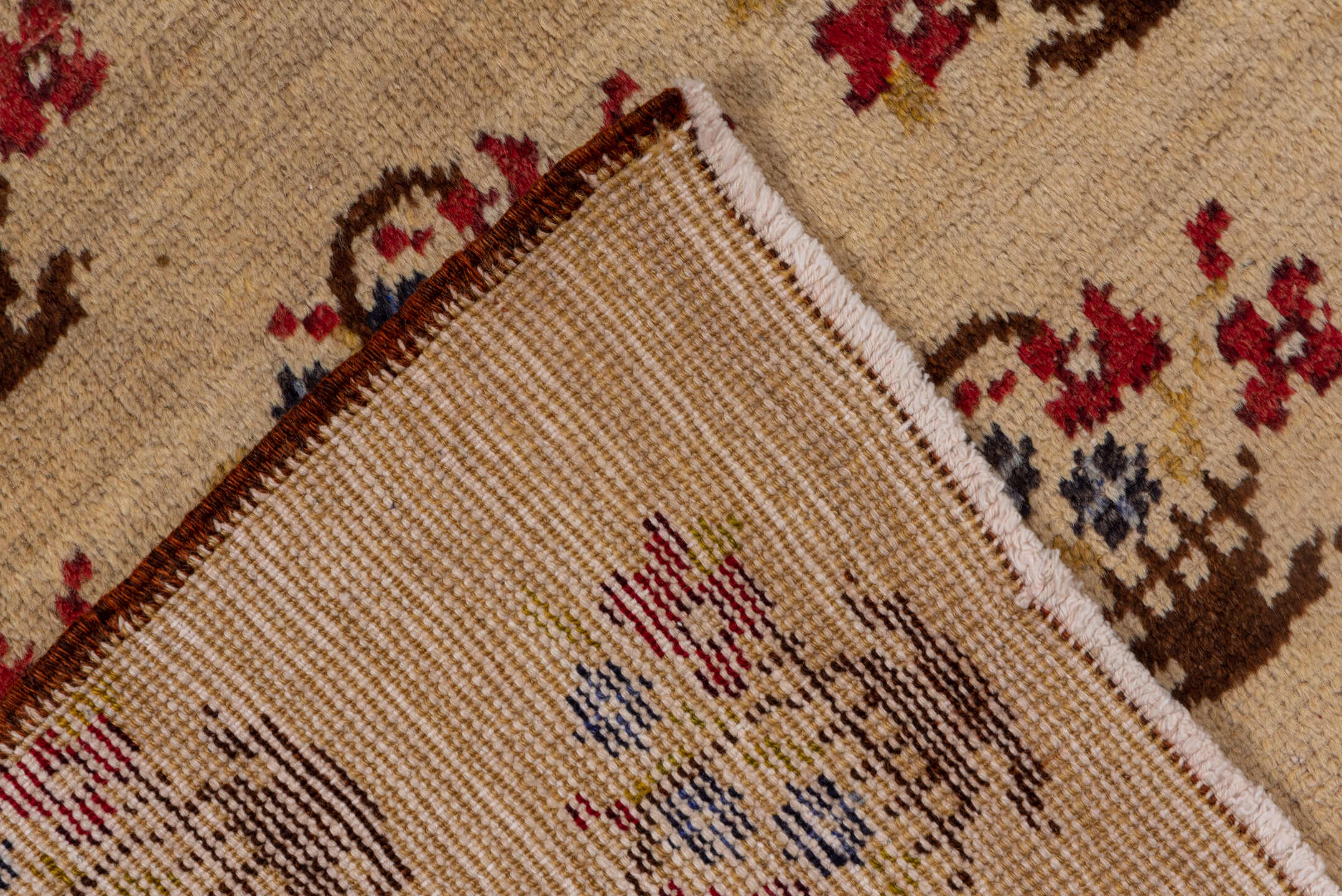 5' x 10' one-of-a-kind handmade vintage Konya medium size rug. Color palette: camel, brown, rust, indigo, ivory, beige