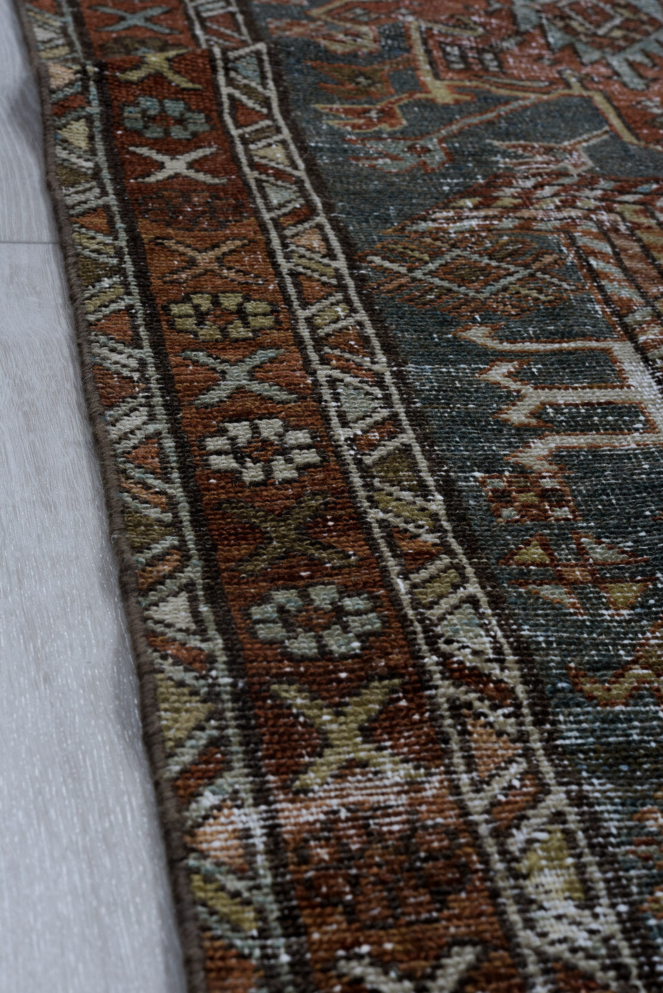 2' x 10' one-of-a-kind handmade vintage Karaje runner rug. Color palette: black, blue, brown, charcoal, gray, light gray