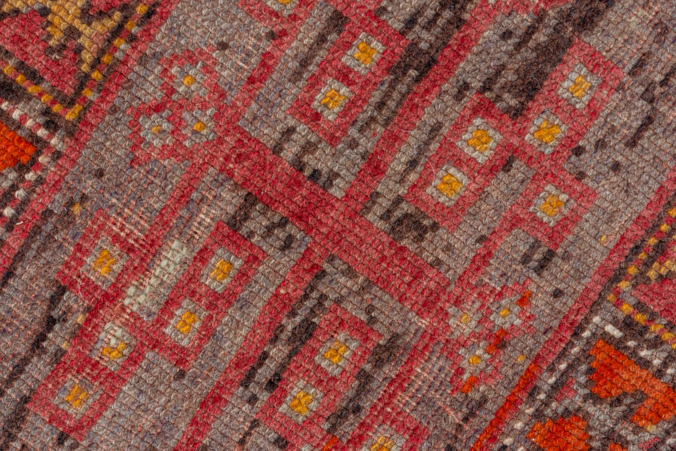 4' x 11' one-of-a-kind handmade vintage Oushak runner rug. Color palette: brown, maroon, pink, red, sienna