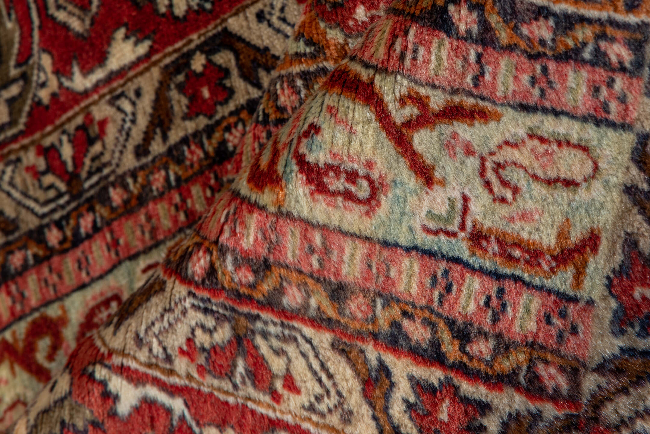 3' x 11' one-of-a-kind handmade vintage Sivas runner rug. Color palette: brown, maroon, orange, pink, red, tan