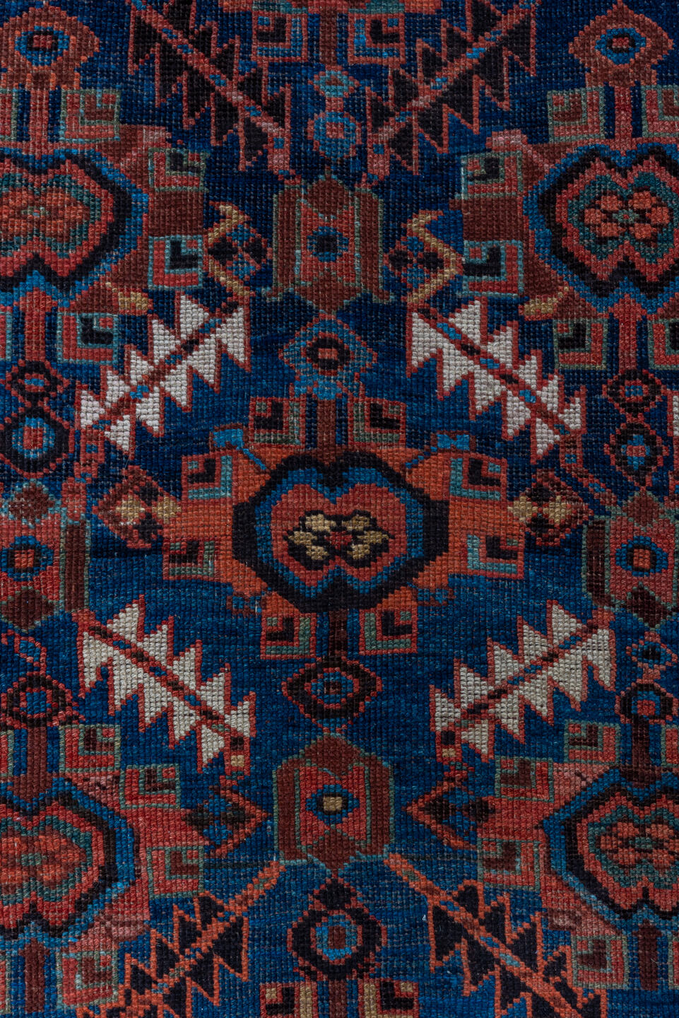 4' x 7' one-of-a-kind handmade antique NW Persian rug. Color palette: indigo, rust, ivory, crimson, slate, camel, charcoal