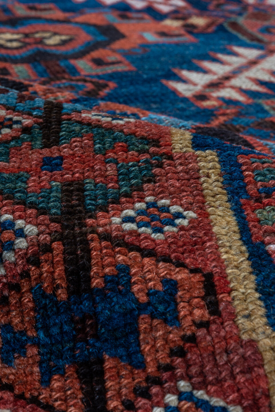 4' x 7' one-of-a-kind handmade antique NW Persian rug. Color palette: indigo, rust, ivory, crimson, slate, camel, charcoal