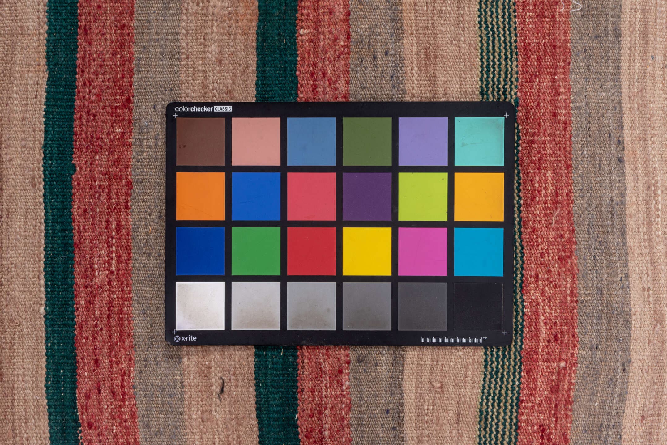 5' x 5' one-of-a-kind handmade vintage Kilim rug. Color palette: taupe, blush, rust, sage, teal, gray, beige, pink