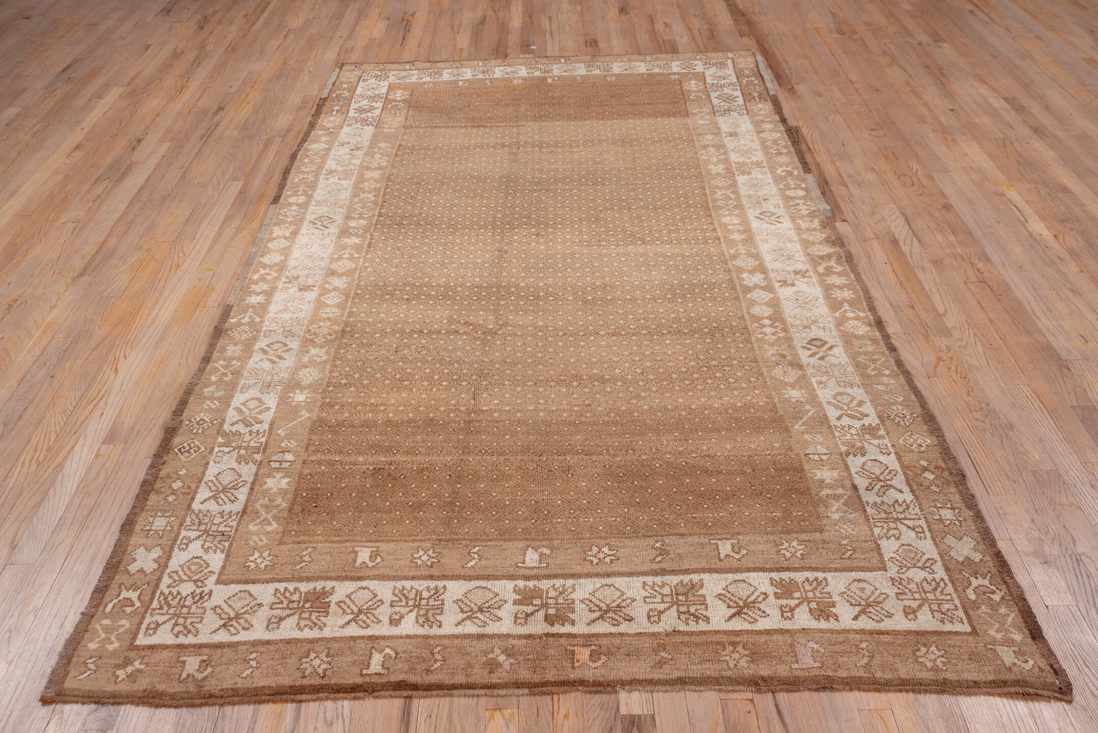 5' x 10' one-of-a-kind handmade vintage Oushak medium size rug. Color palette: camel, taupe, beige, ivory, sand, brown, gray