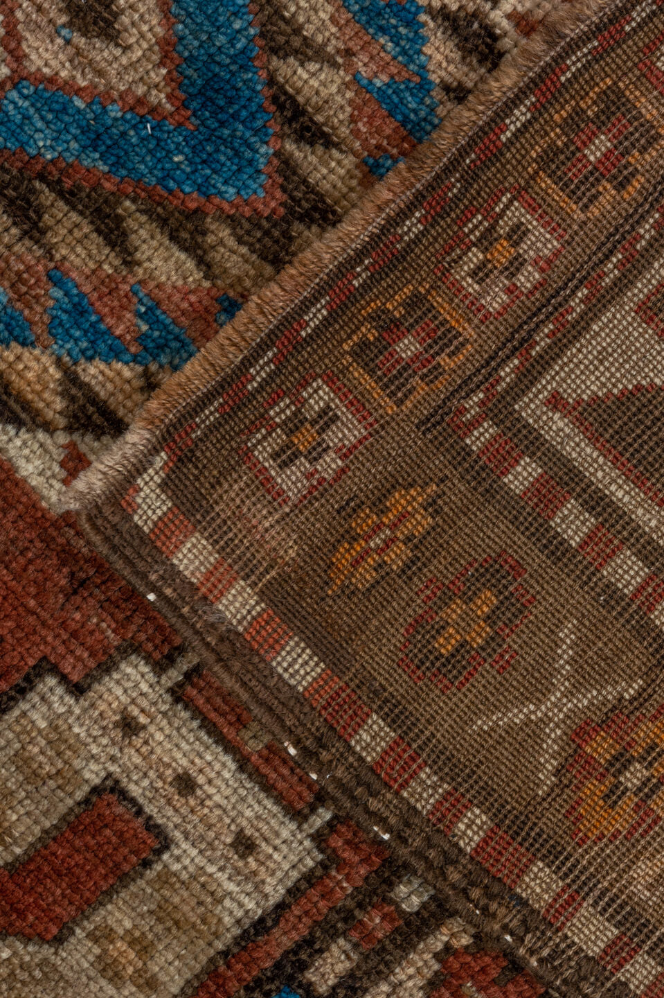4' x 9' one-of-a-kind handmade vintage Kurd runner rug. Color palette: arapawa, blue, brown, gray, light gray, pink