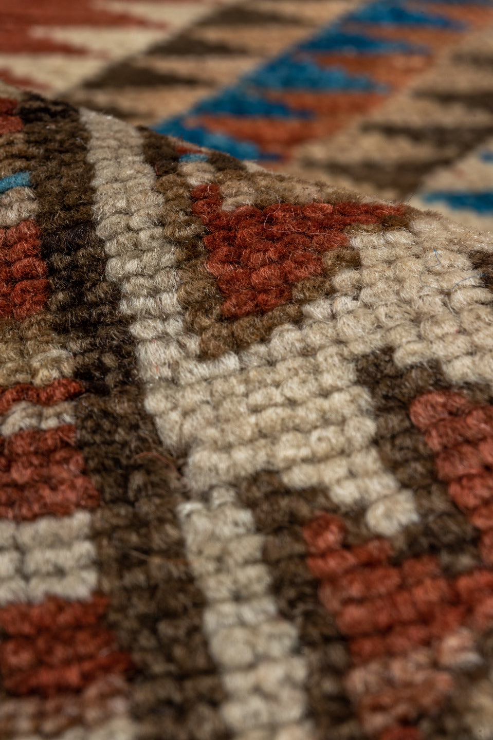 4' x 9' one-of-a-kind handmade vintage Kurd runner rug. Color palette: arapawa, blue, brown, gray, light gray, pink