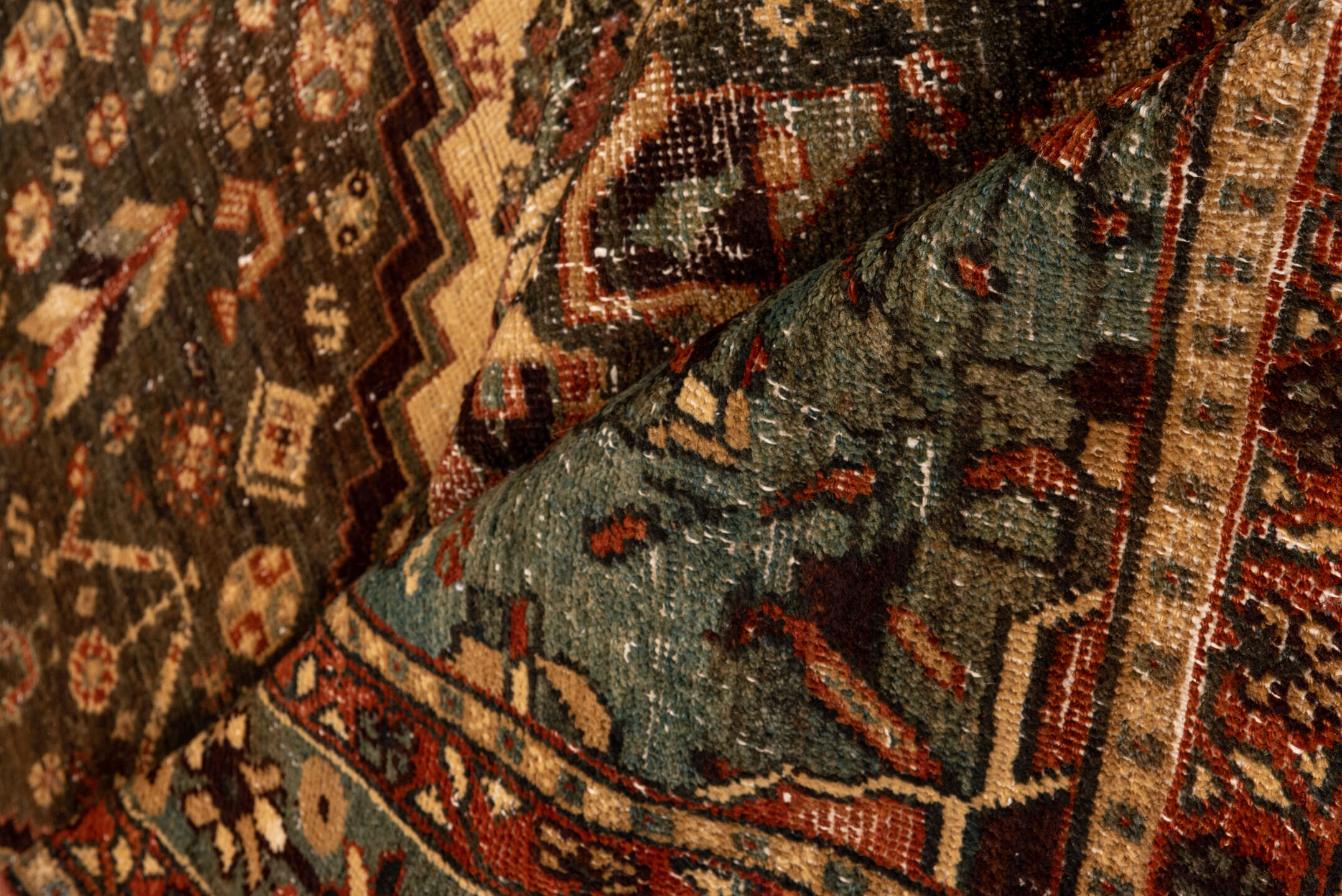 5' x 12' one-of-a-kind handmade vintage Baktiary rug. Color palette: brown, red