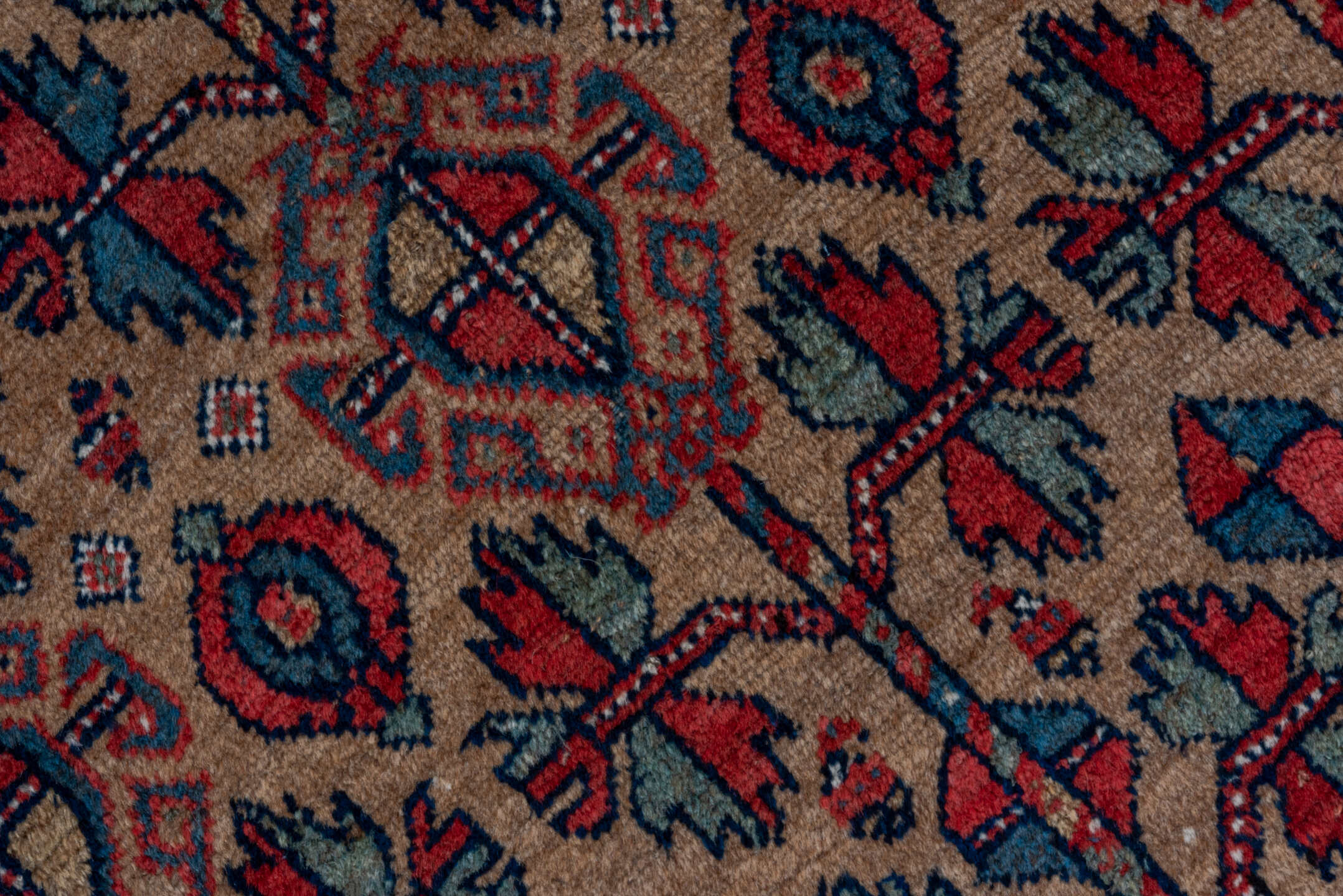 3' x 5' one-of-a-kind handmade vintage Kurd small size rug. Color palette: rust, camel, indigo, ivory, crimson, charcoal