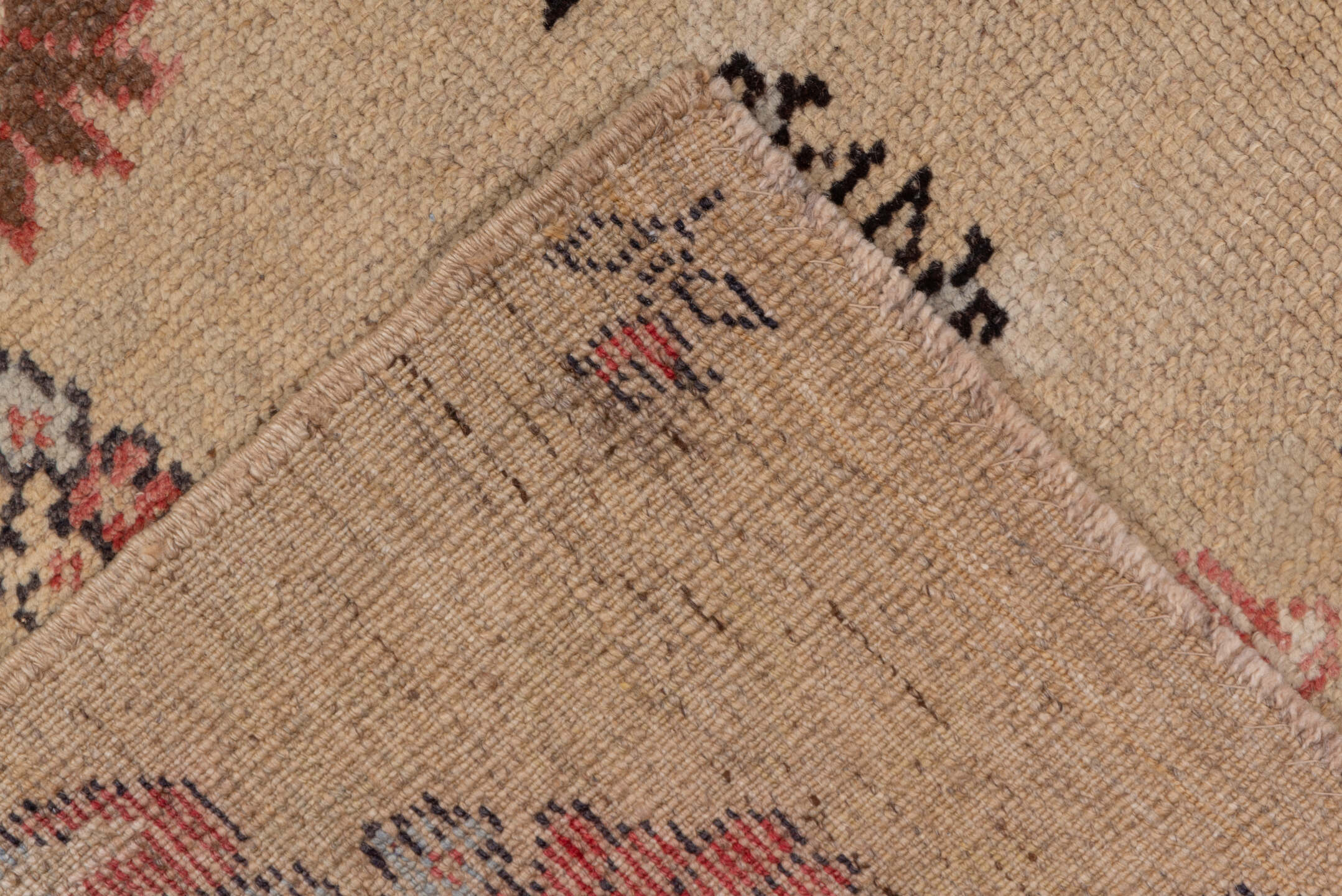 5' x 11' one-of-a-kind handmade vintage Konya runner rug. Color palette: brown, gray, off-white, orange, pink, red, tan