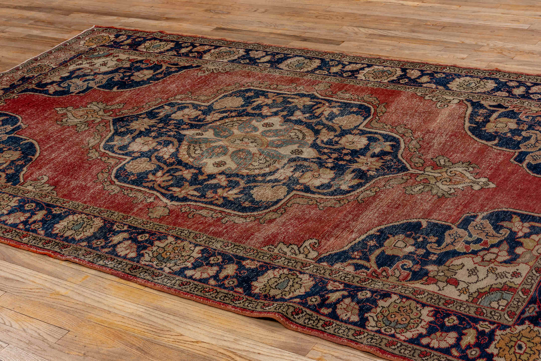 5' x 9' one-of-a-kind handmade antique Oushak medium size rug. Color palette: terra cotta, navy, ivory, beige, slate, rust