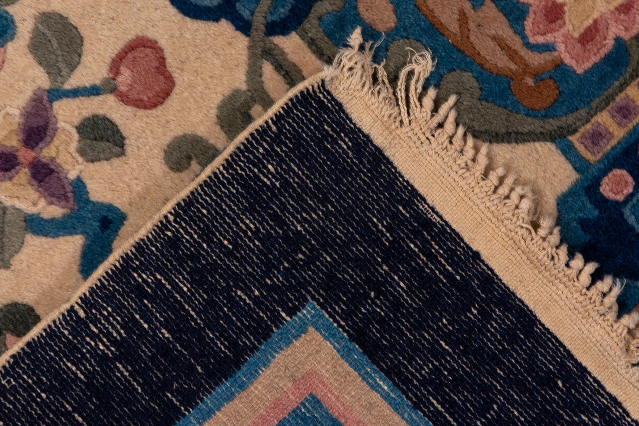 4' x 5' one-of-a-kind handmade vintage Chinese small size rug. Color palette: ivory, navy, blue, rose, sage, lavender, taupe