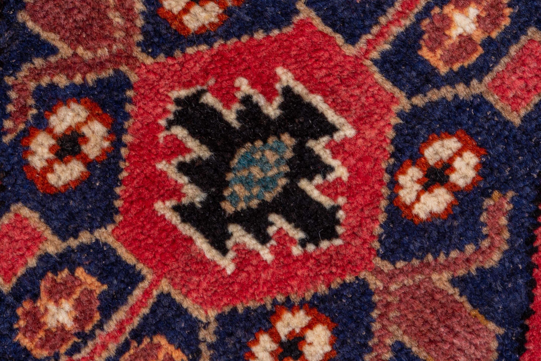 2' x 10' one-of-a-kind handmade vintage Veece runner rug. Color palette: ivory, navy, rust, rose, crimson, camel, charcoal