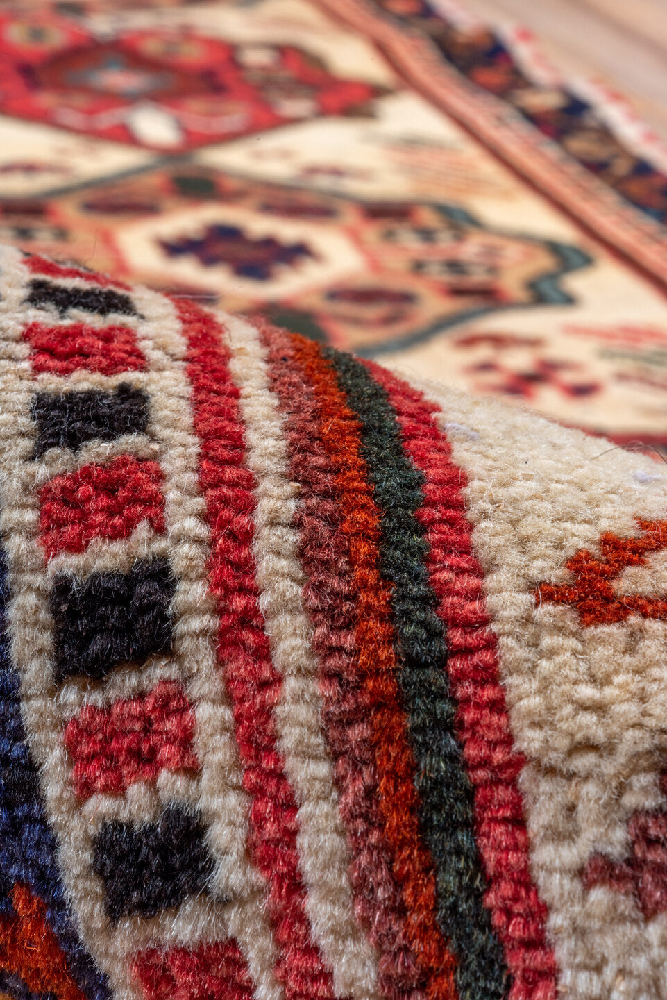 2' x 10' one-of-a-kind handmade vintage Veece runner rug. Color palette: ivory, navy, rust, rose, crimson, camel, charcoal