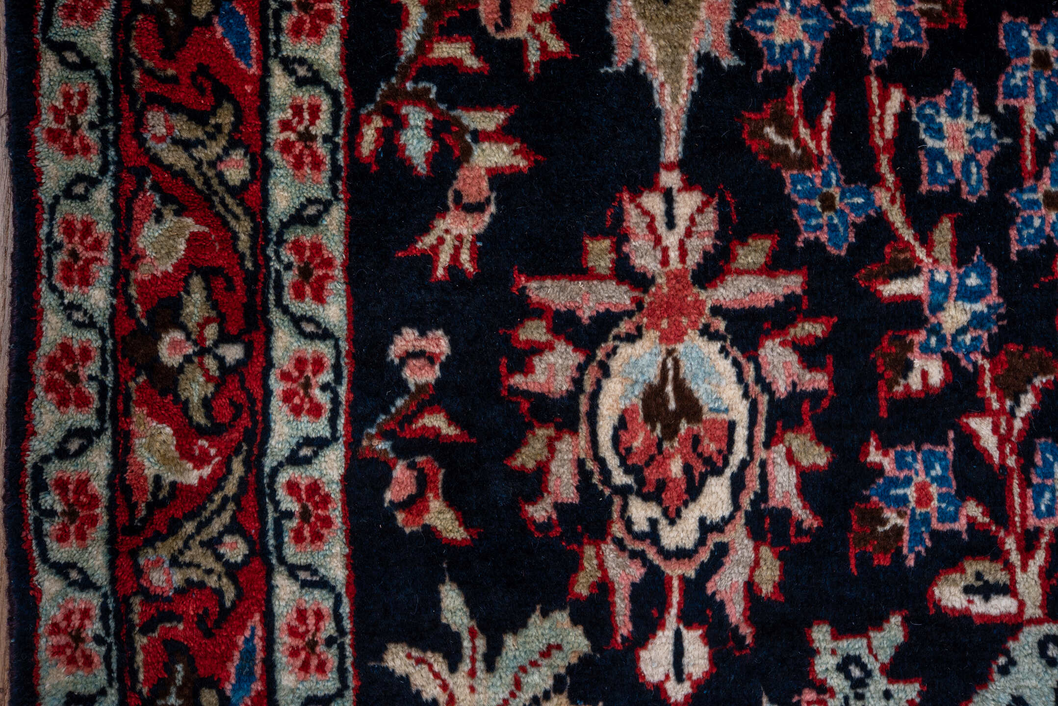 4' x 10' one-of-a-kind handmade vintage Mahal runner rug. Color palette: arapawa, black, blue, brown, gray, pink, red