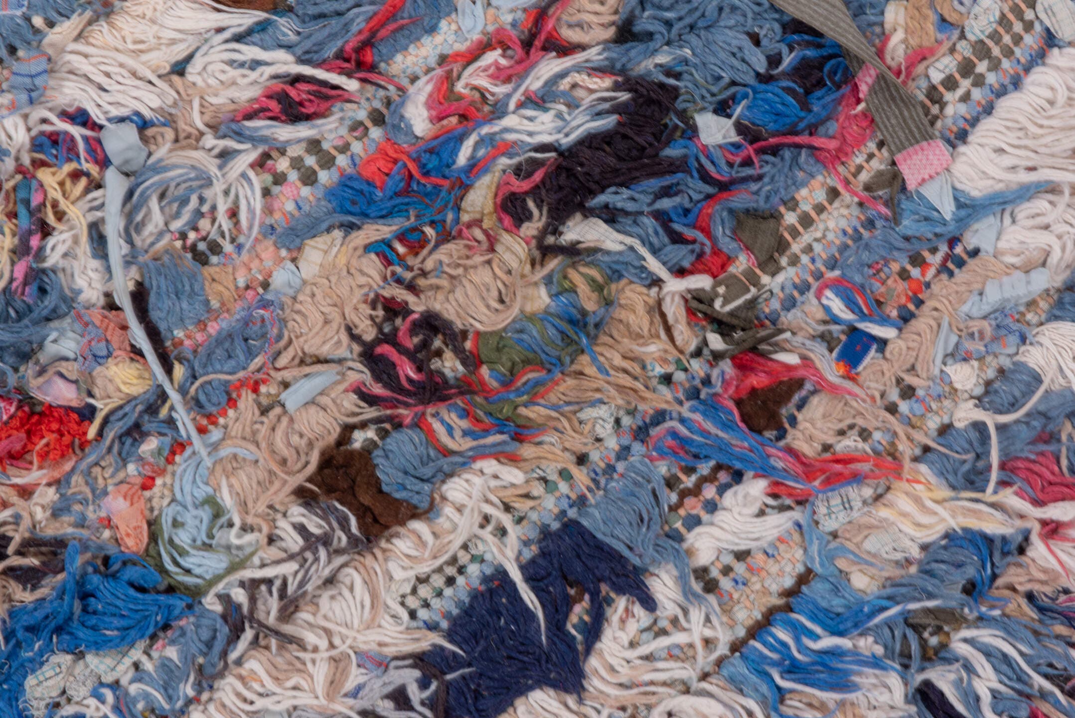 2' x 6' one-of-a-kind handmade vintage Rag Rug runner rug. Color palette: brown, ivory, blue, red, charcoal, cream, burgundy