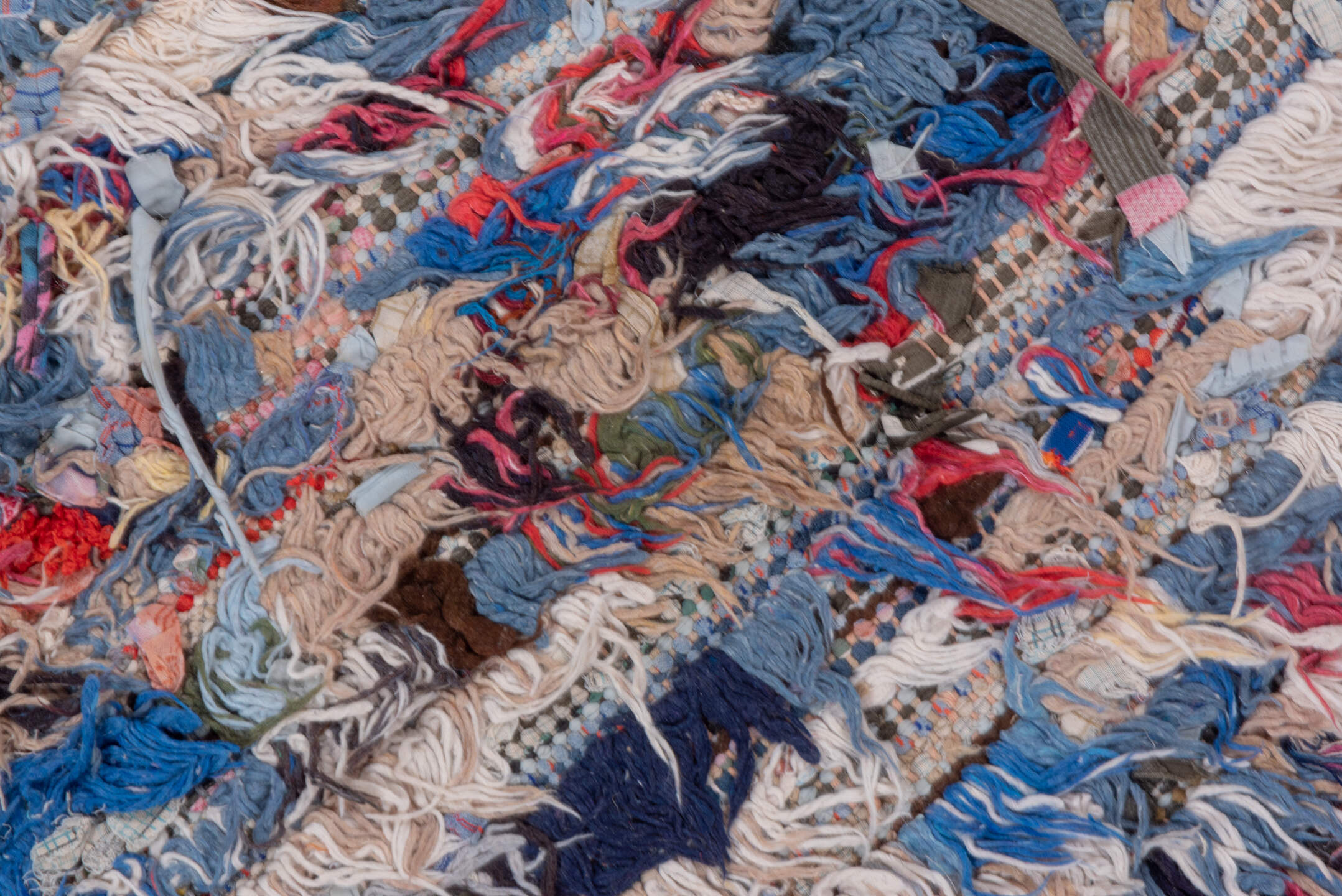 2' x 6' one-of-a-kind handmade vintage Rag Rug runner rug. Color palette: brown, ivory, blue, red, charcoal, cream, burgundy