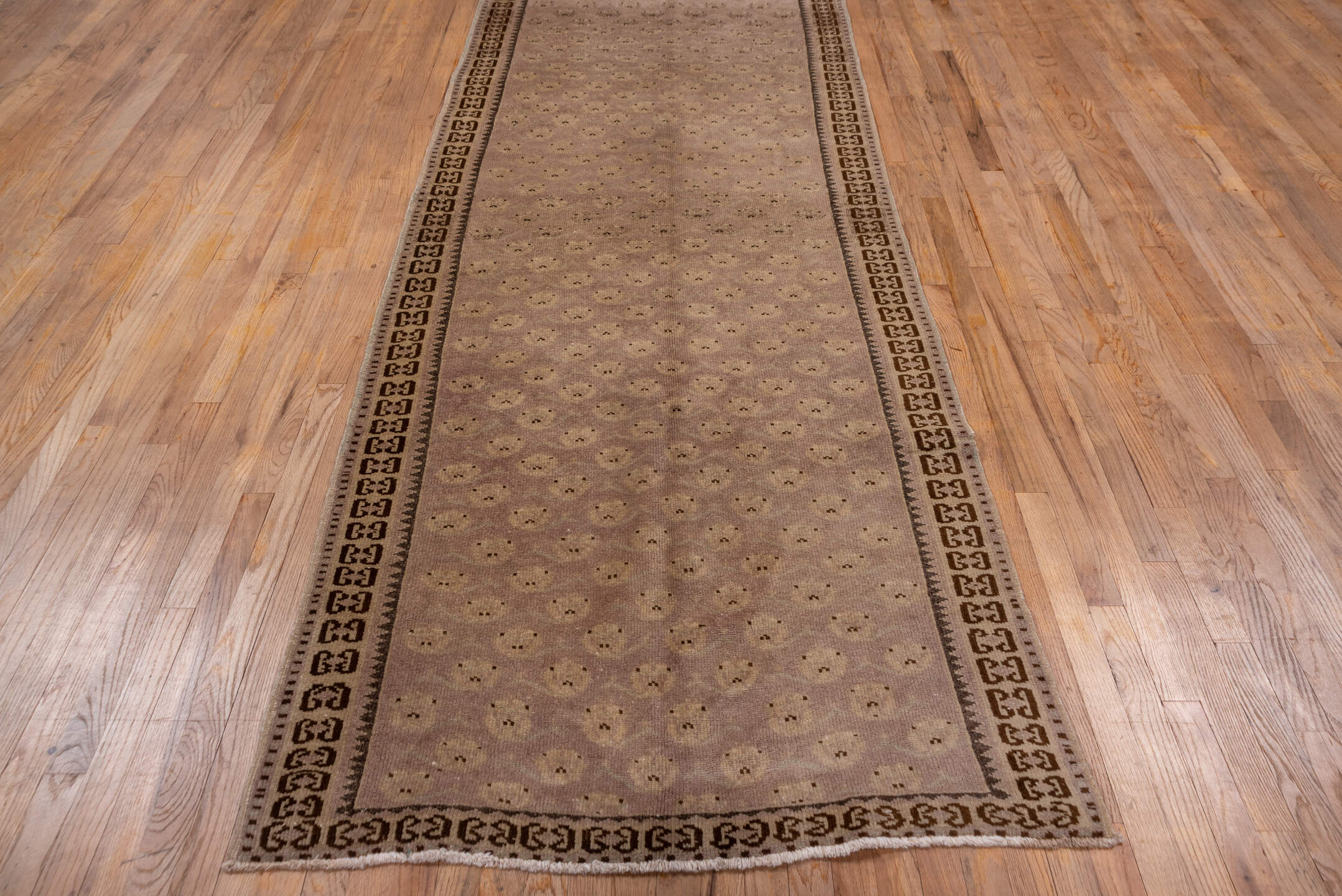 4' x 10' one-of-a-kind handmade vintage Oushak runner rug. Color palette: brown, gray, light gray, off-white, pink, snow