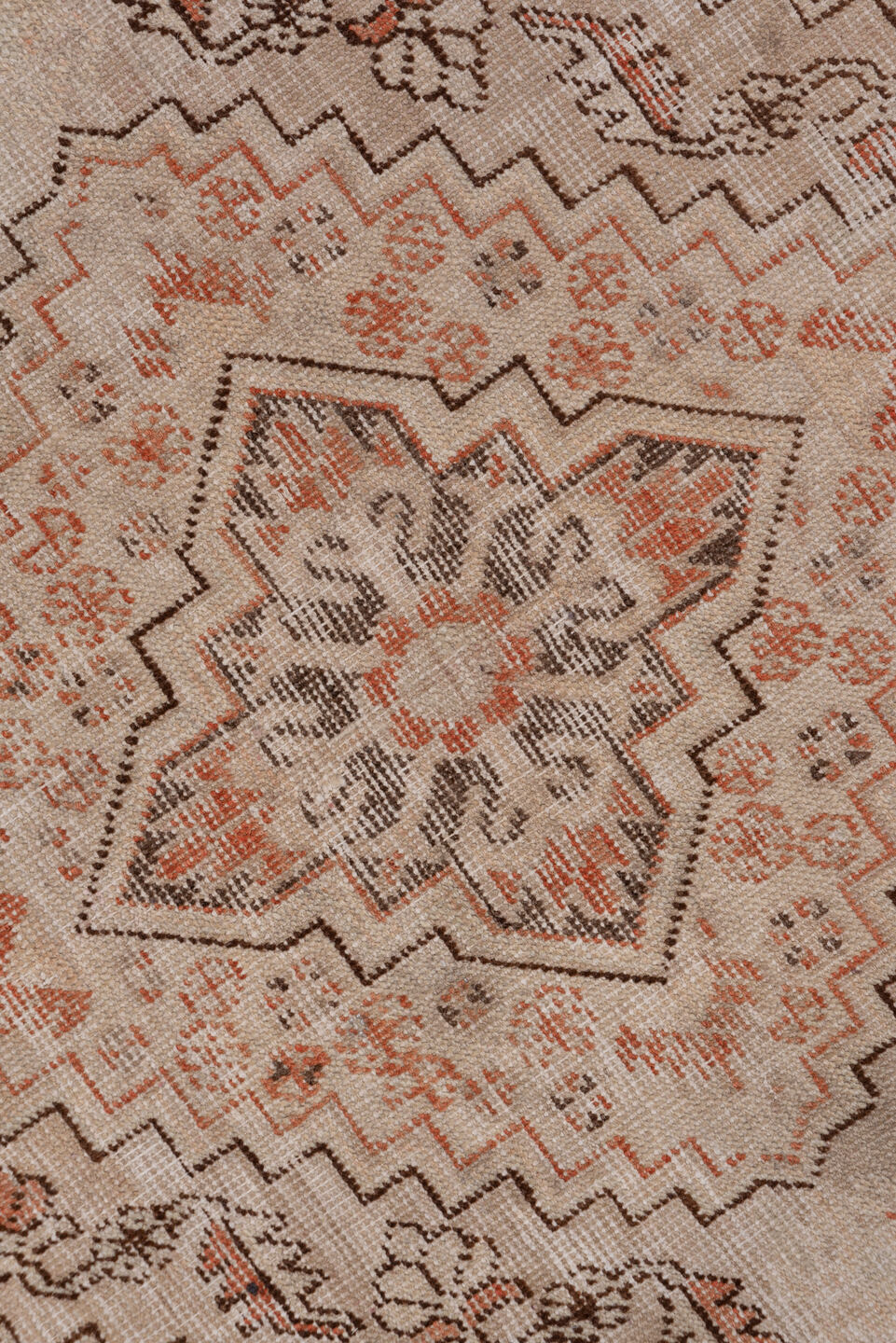 5' x 9' one-of-a-kind handmade vintage Khotan medium size rug. Color palette: brown, gray, light gray, off-white, pink