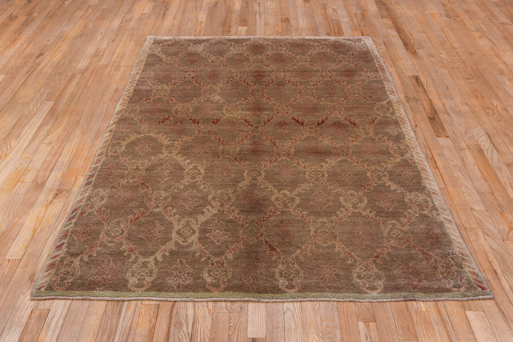 4' x 8' one-of-a-kind handmade vintage Tulu rug. Color palette: taupe, camel, rose, ivory, beige, gray, pink, red