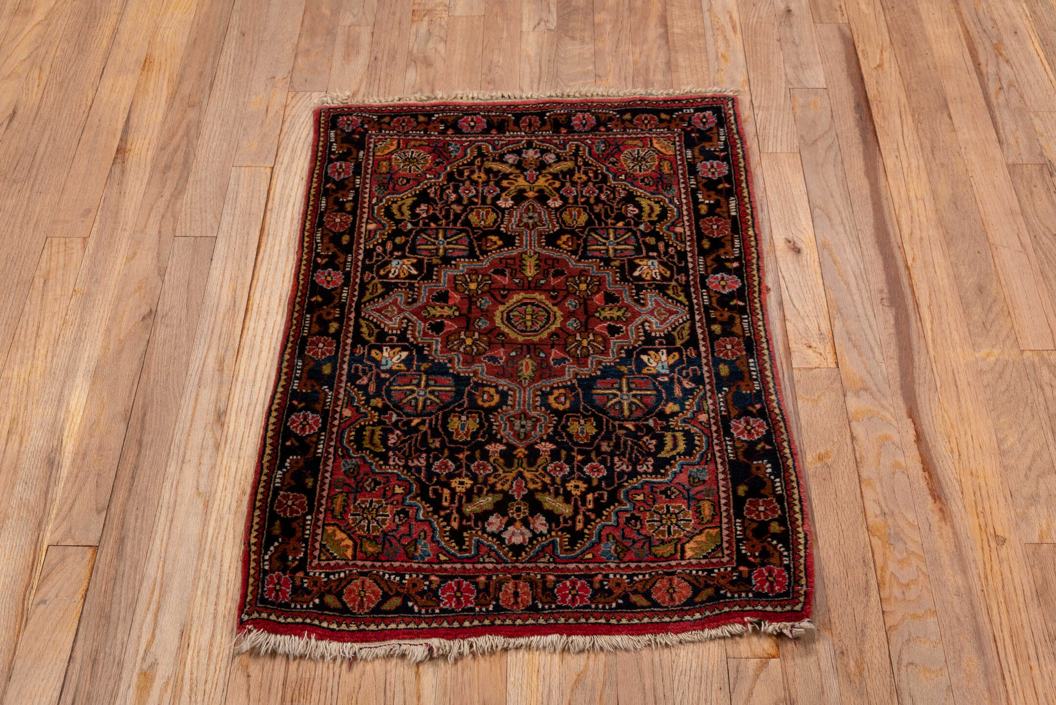 2' x 3' one-of-a-kind handmade vintage Jozan small size rug. Color palette: navy, rust, rose, ivory, sky blue, burgundy