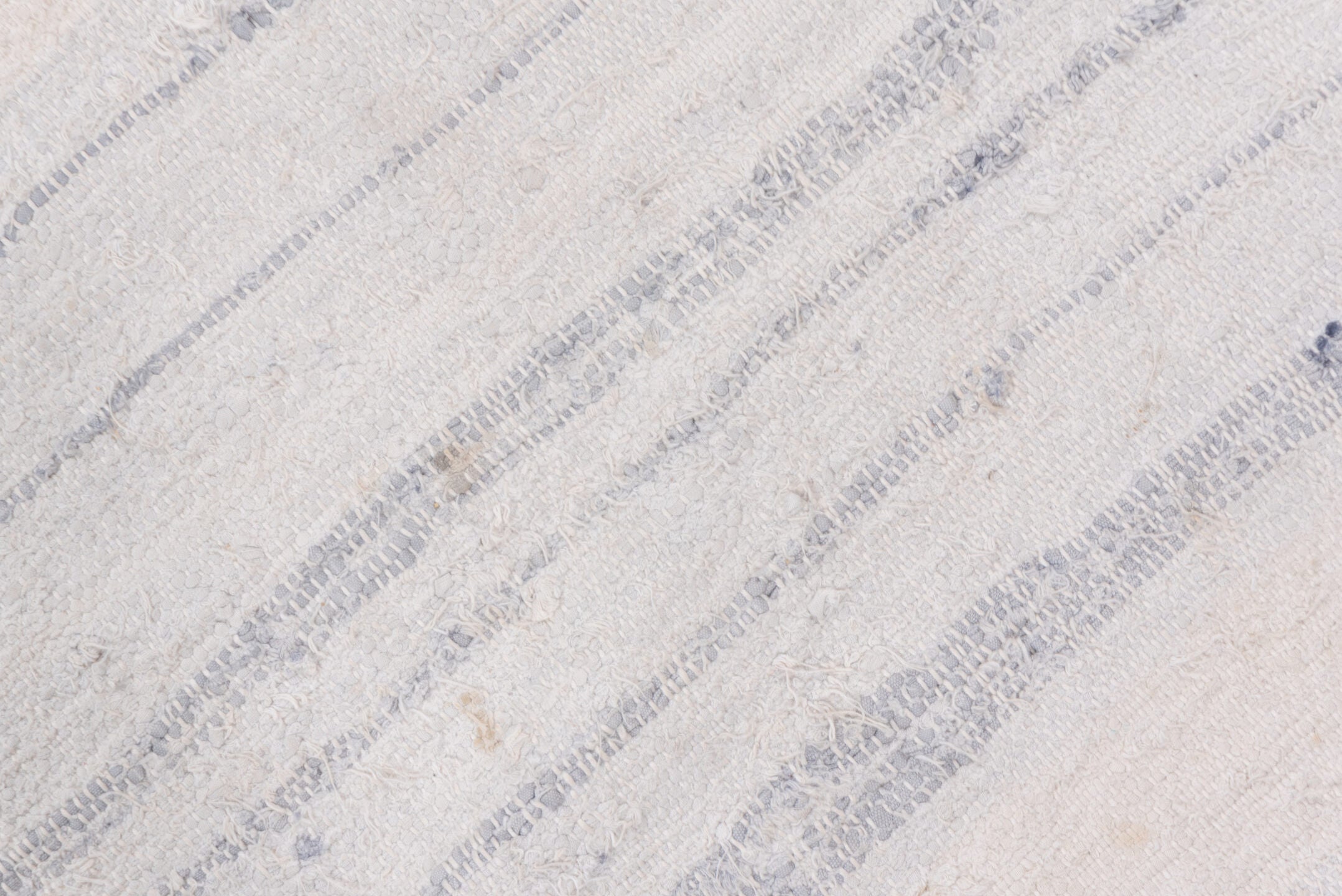 6' x 7' one-of-a-kind handmade antique Rag Rug rug. Color palette: ivory, cream, charcoal, slate, faded blue, taupe, gray